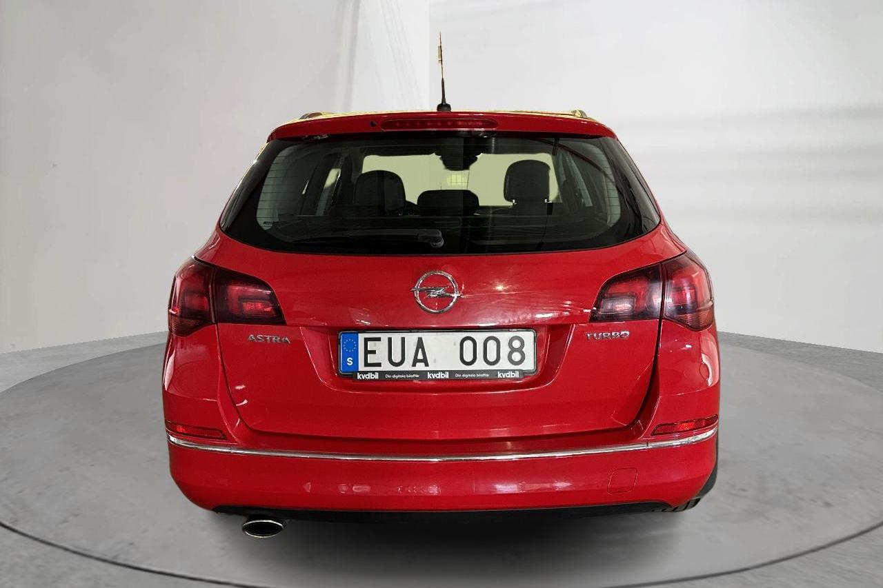Opel Astra 1.4 Turbo ECOTEC Sports Tourer (140hk) - 136 730 km - Manuaalinen - punainen - 2013