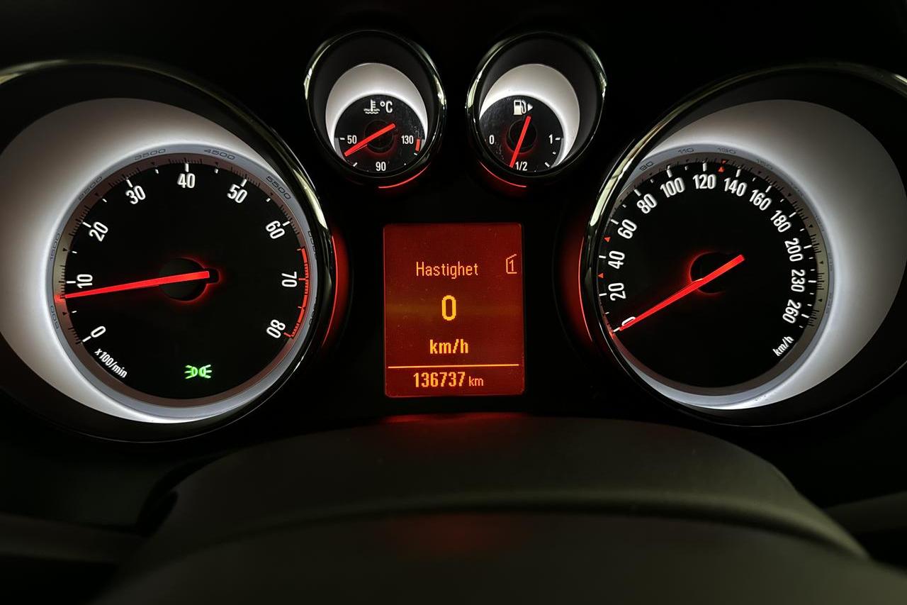 Opel Astra 1.4 Turbo ECOTEC Sports Tourer (140hk) - 136 730 km - Manuaalinen - punainen - 2013
