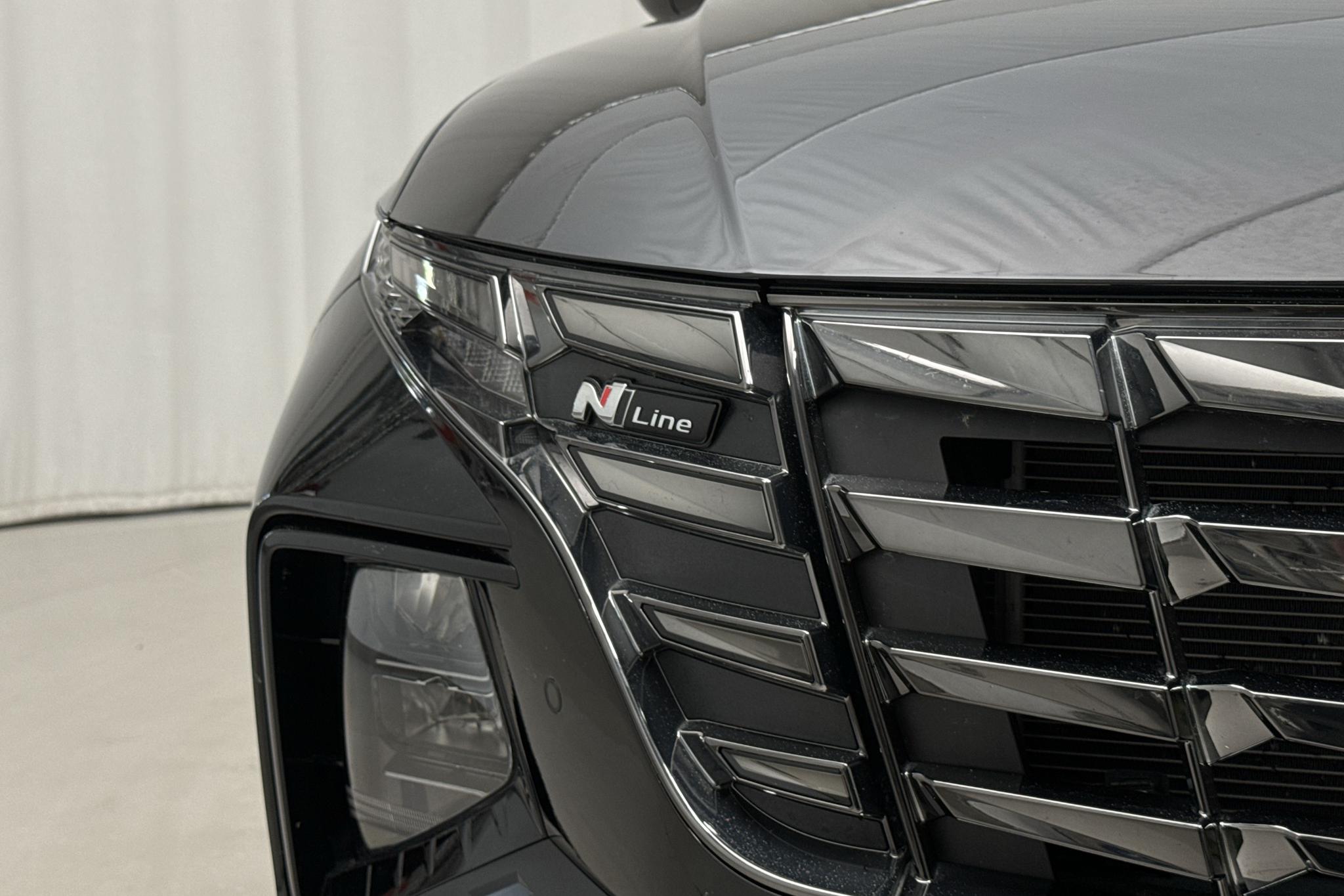 Hyundai Tucson 1.6 GDI M-hybrid 4WD (180hk) - 11 990 km - Automatyczna - czarny - 2021