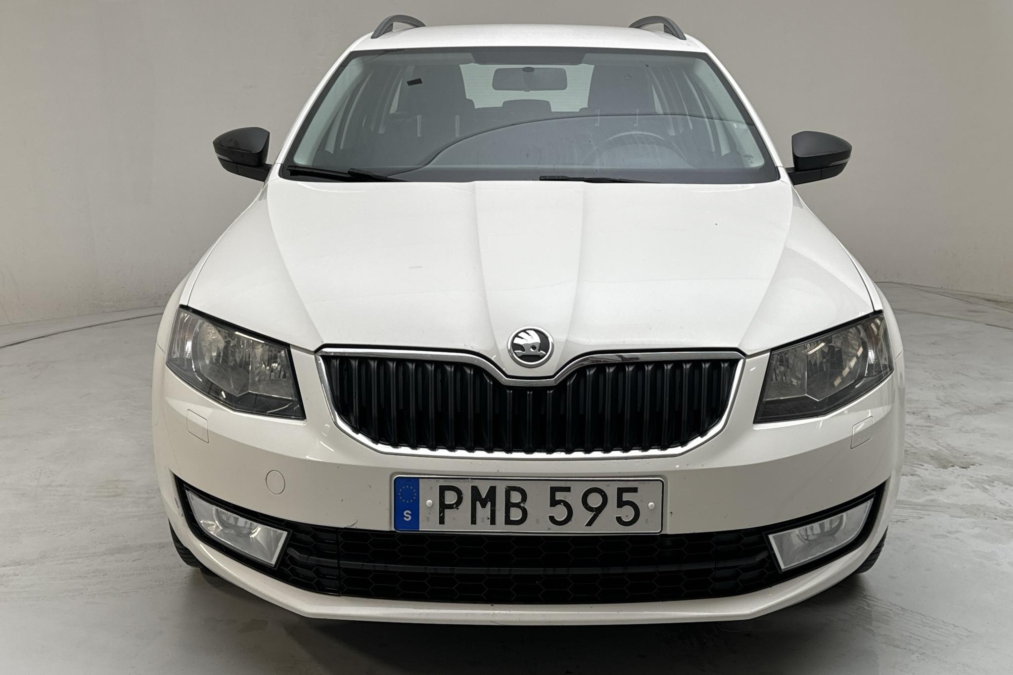 Skoda Octavia III 1.6 TDI CR Combi 4X4 (105hk) - 152 490 km - Manual - white - 2014