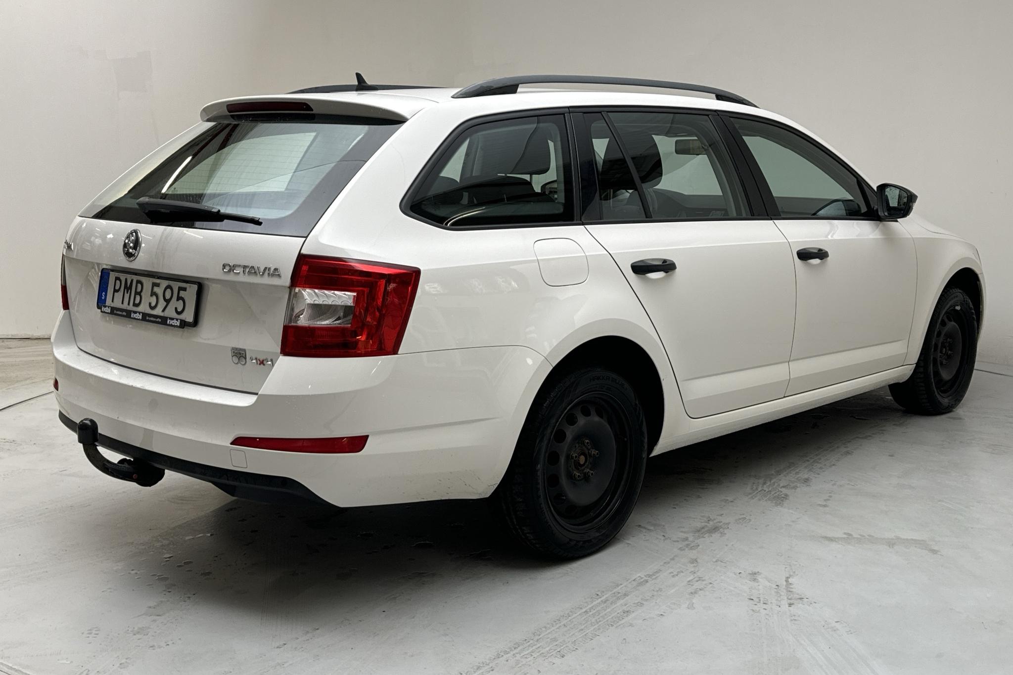 Skoda Octavia III 1.6 TDI CR Combi 4X4 (105hk) - 152 490 km - Manualna - biały - 2014