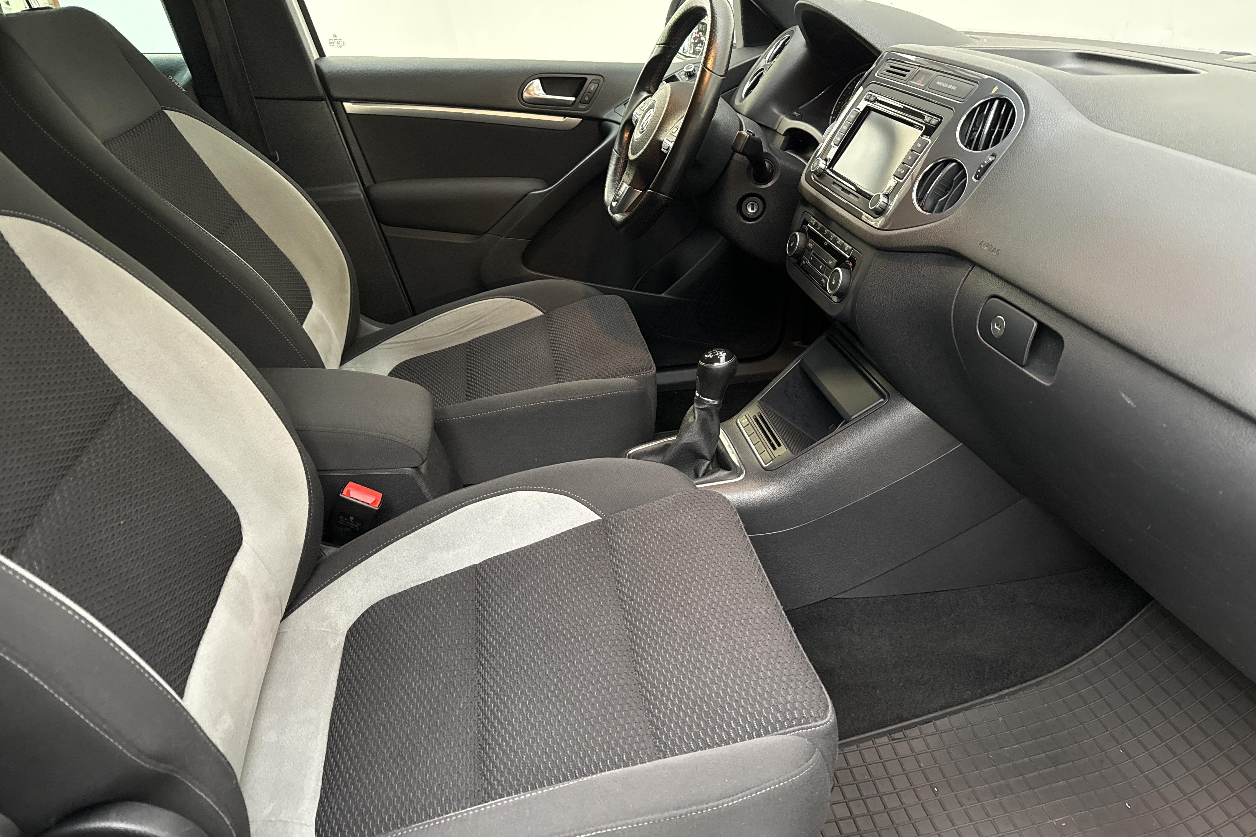 VW Tiguan 1.4 TSI 4MOTION (160hk) - 139 140 km - Manuaalinen - valkoinen - 2014