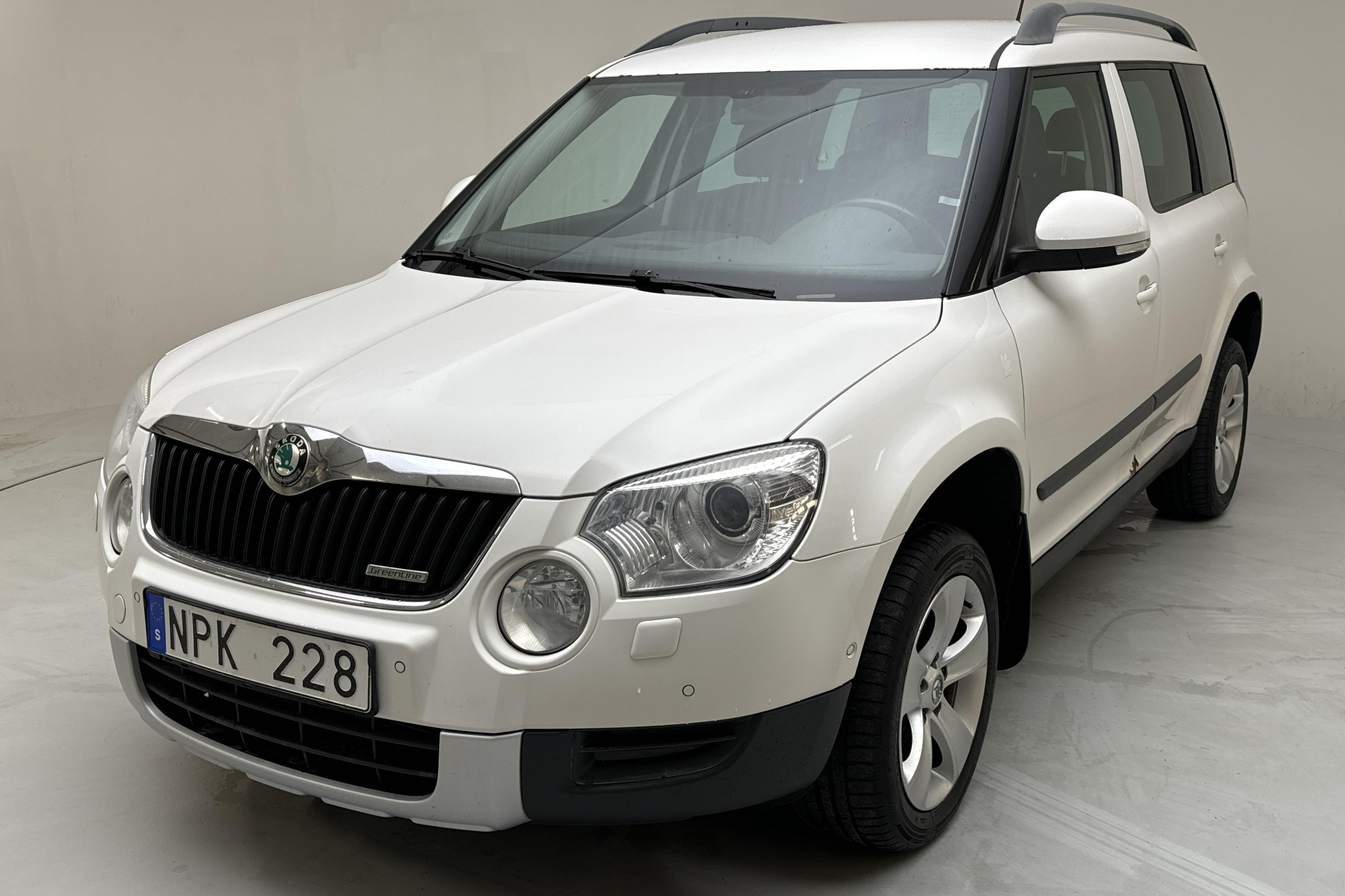 Skoda Yeti 1.6 GreenLine TDI CR (105hk) - 174 850 km - Käsitsi - valge - 2012