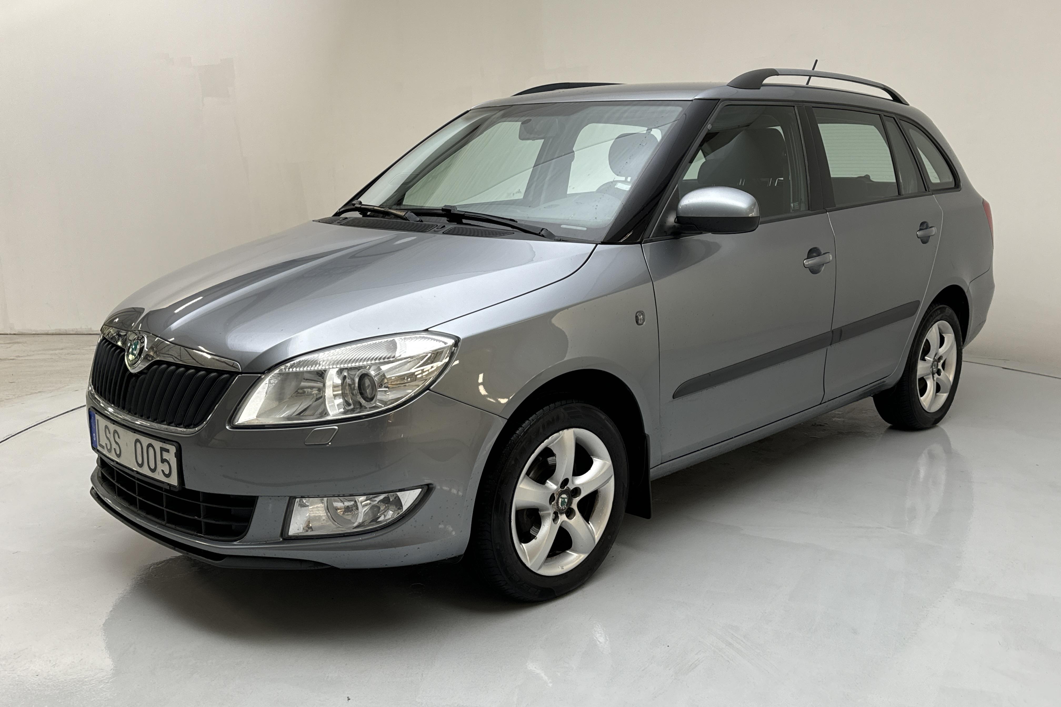 Skoda Fabia 1.2 TSI Combi (86hk) - 116 220 km - Manualna - srebro - 2013