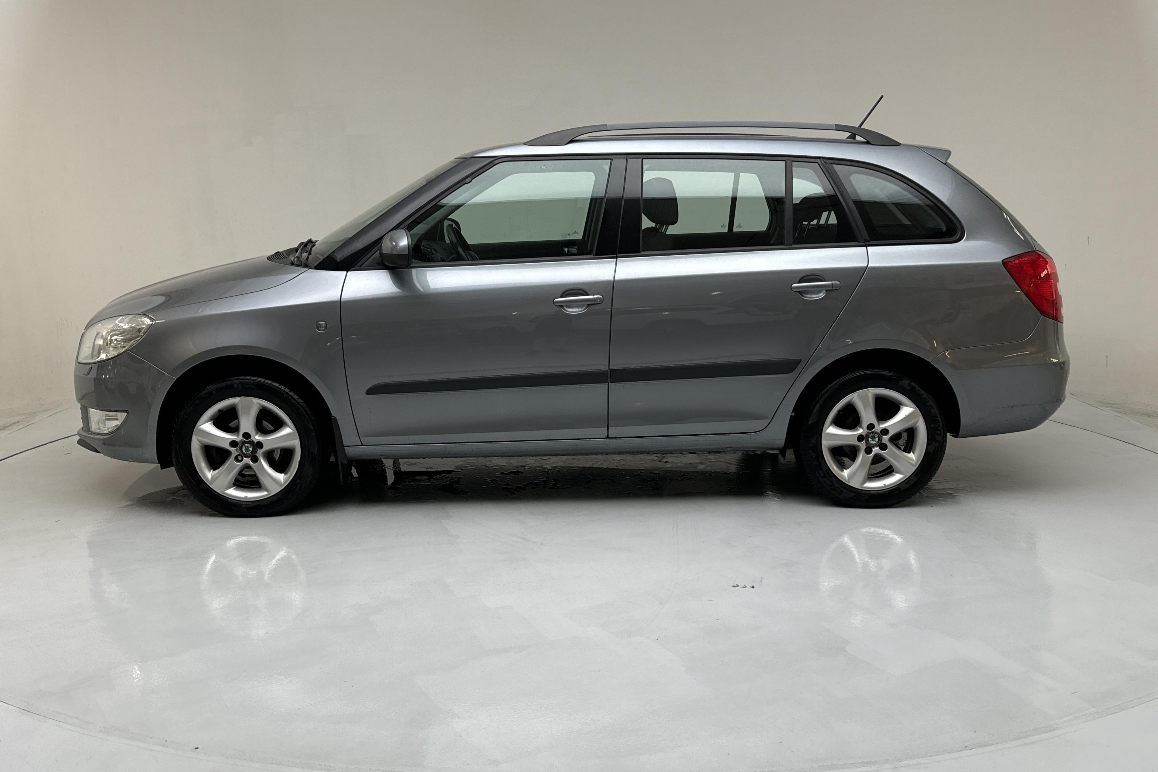 Skoda Fabia 1.2 TSI Combi (86hk) - 116 220 km - Manualna - srebro - 2013