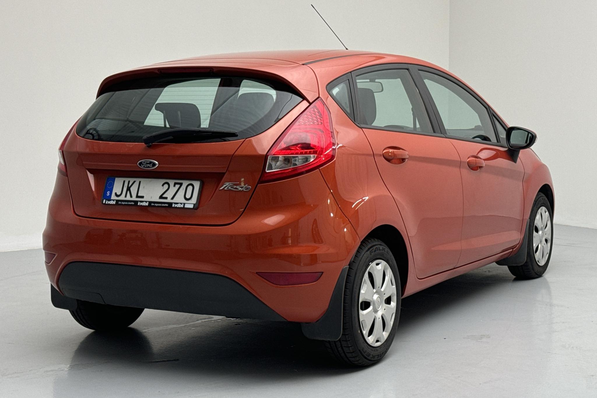 Ford Fiesta 1.4 TDCi 5dr (70hk) - 107 150 km - Manualna - Pomarańczowy - 2012