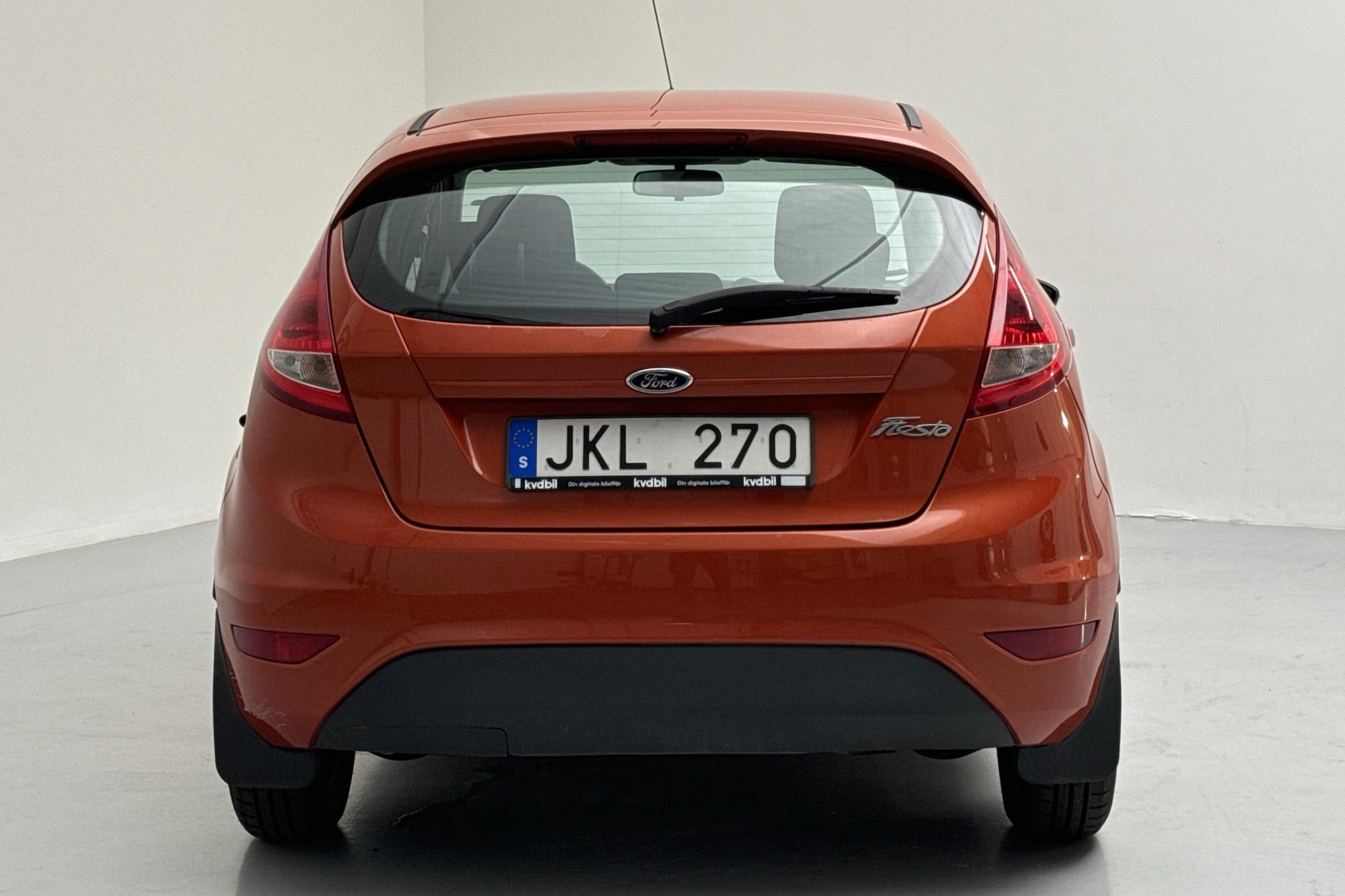 Ford Fiesta 1.4 TDCi 5dr (70hk) - 107 150 km - Manualna - Pomarańczowy - 2012