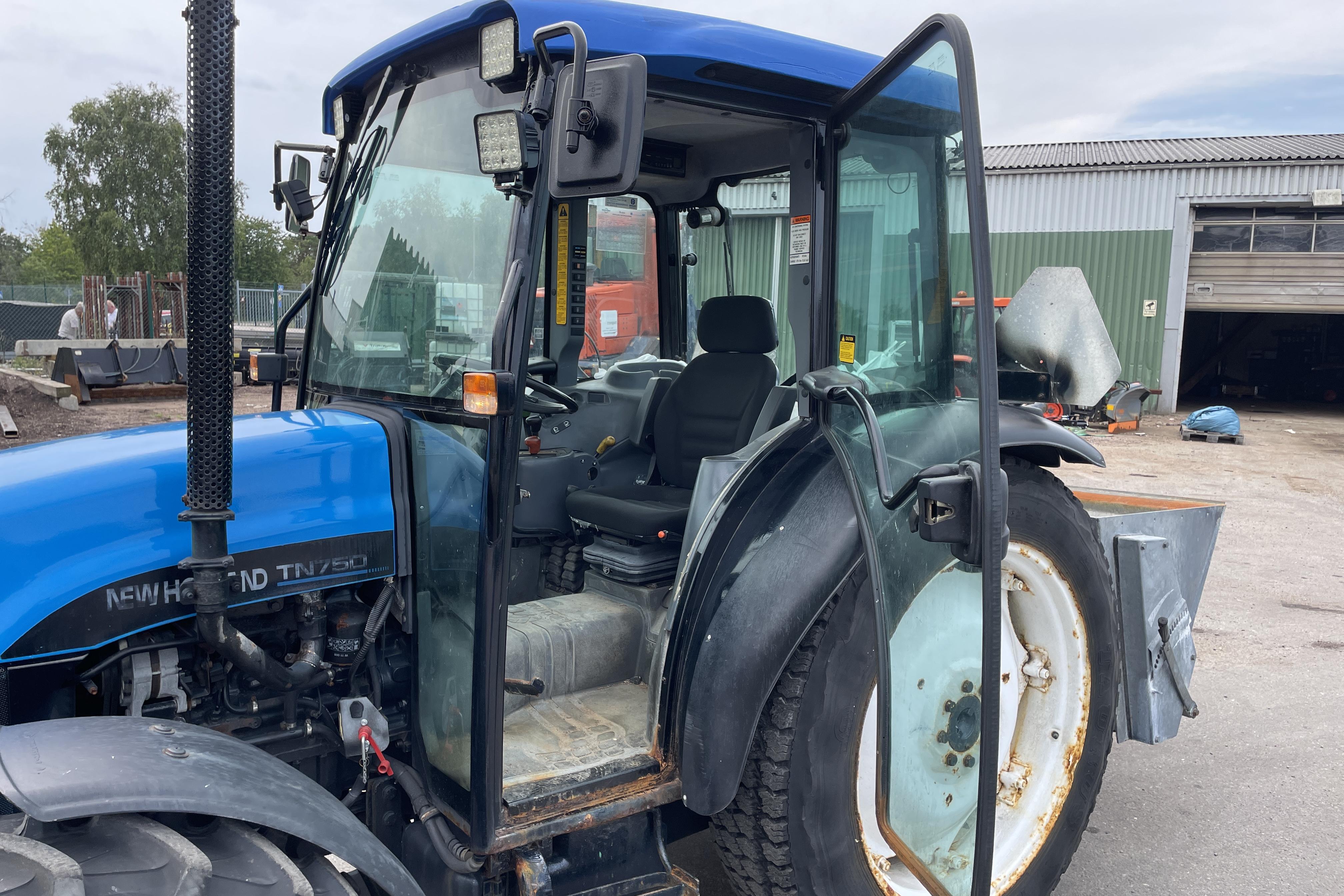 New Holland TN75D 4WD -  - Manual - blue - 2002