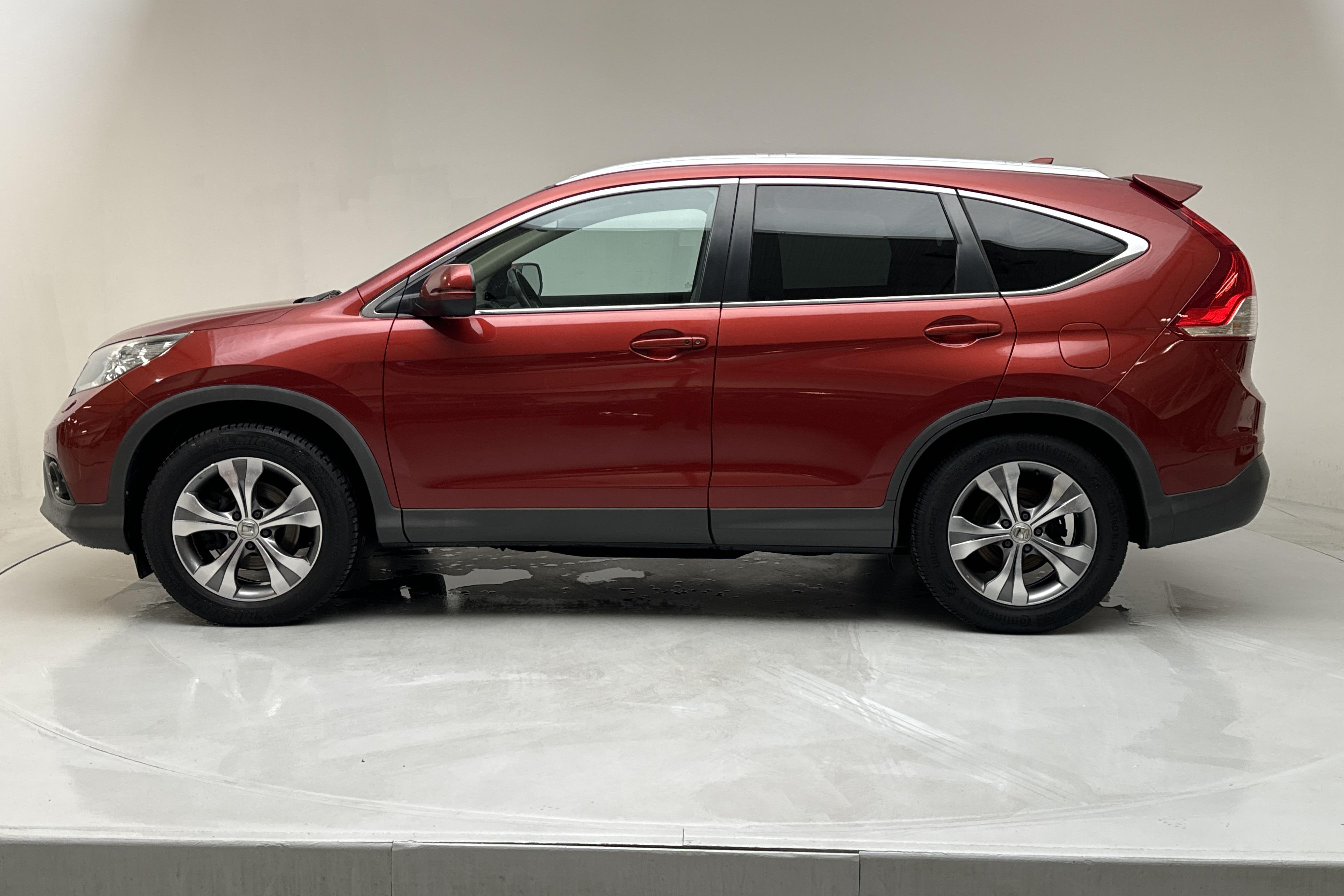 Honda CR-V 2.2 i-DTEC 4WD (150hk) - 197 330 km - Automaatne - punane - 2014