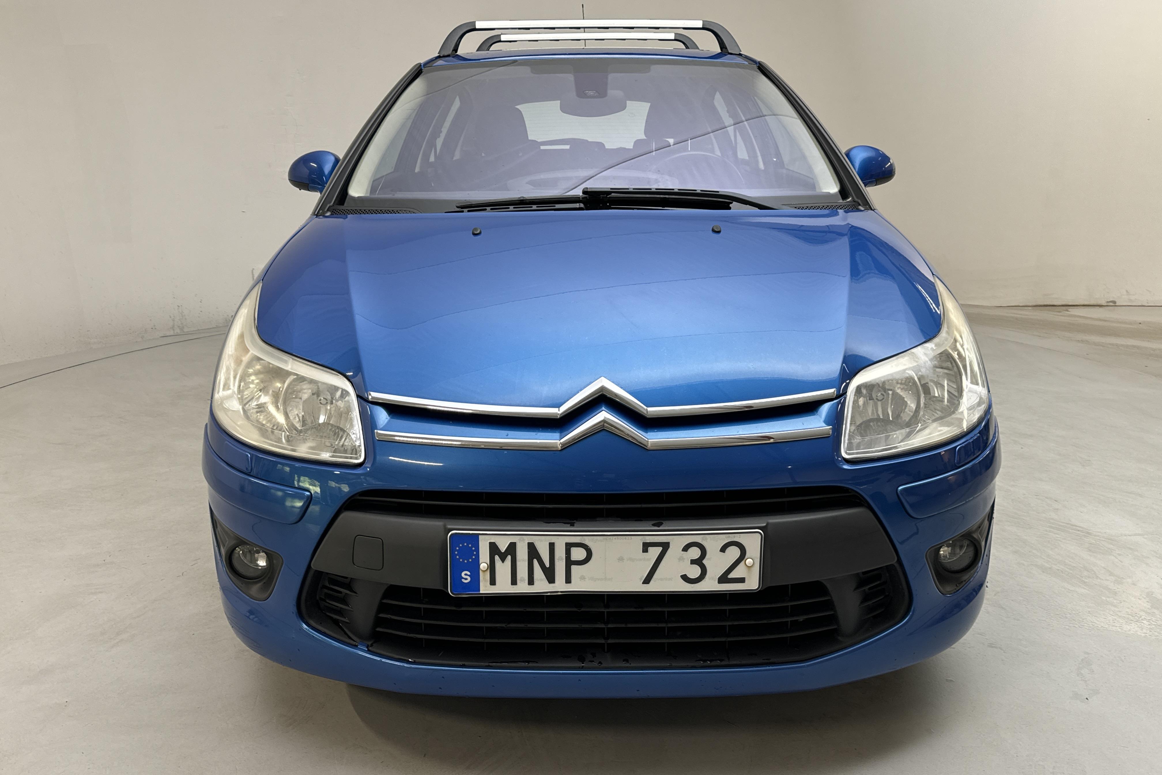 Citroen C4 1.6 HDI (110hk) - 132 200 km - Automatyczna - niebieski - 2009