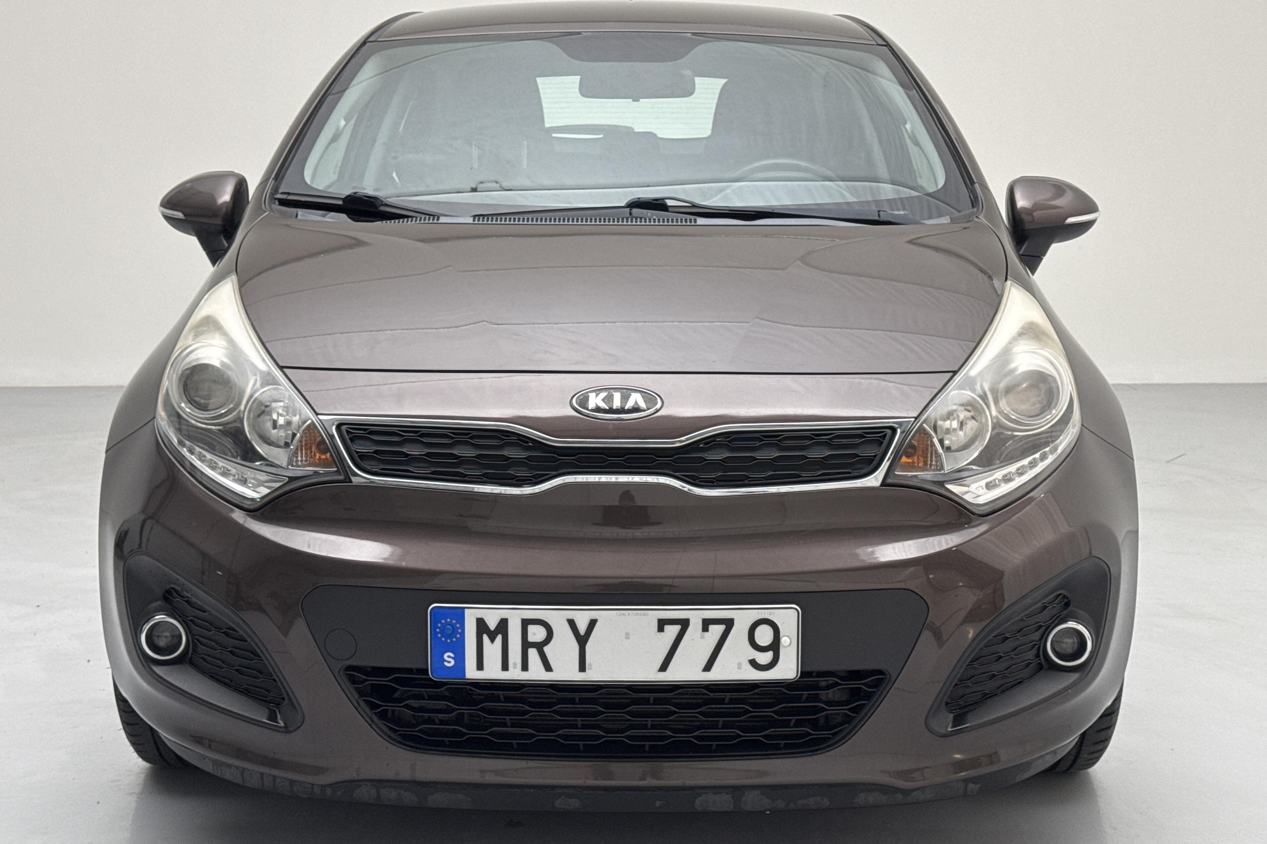 KIA Rio 1.4 (109hk) - 35 020 km - Manualna - brązowy - 2012