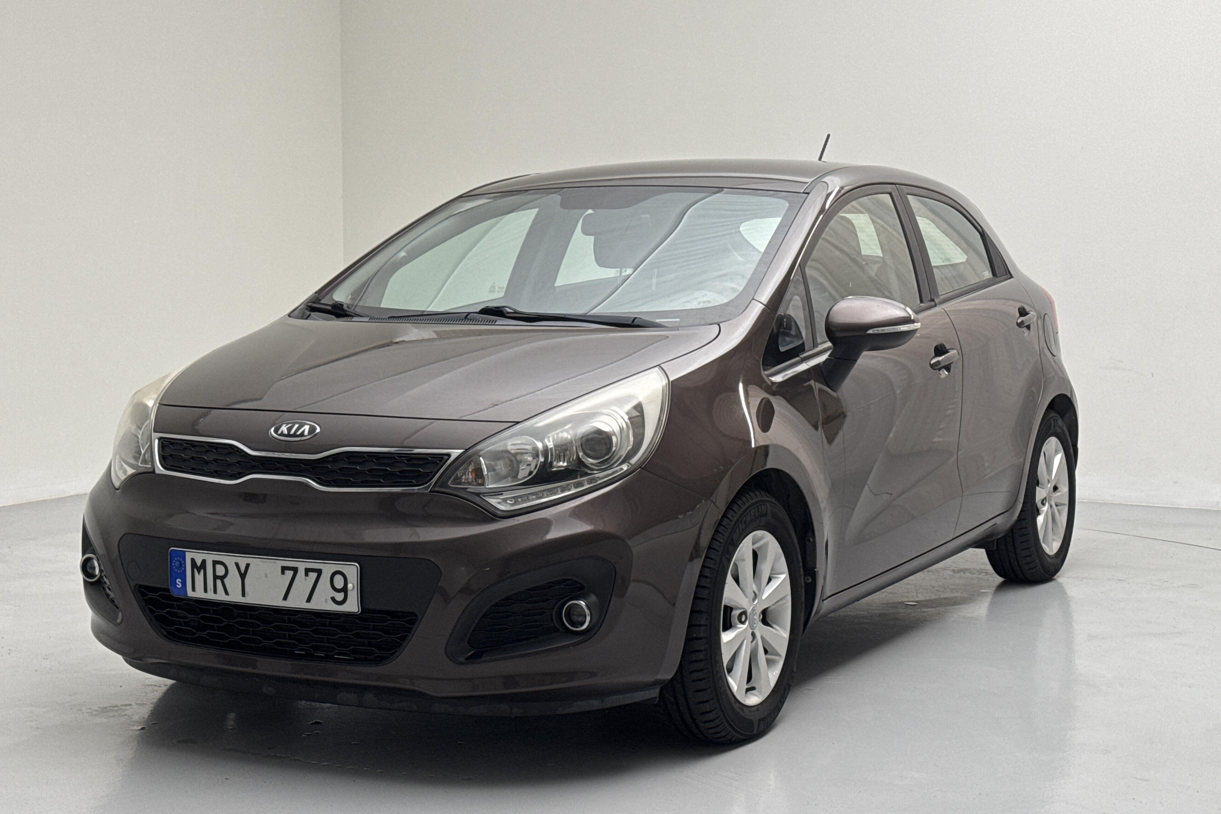 KIA Rio 1.4 (109hk) - 35 020 km - Manualna - brązowy - 2012