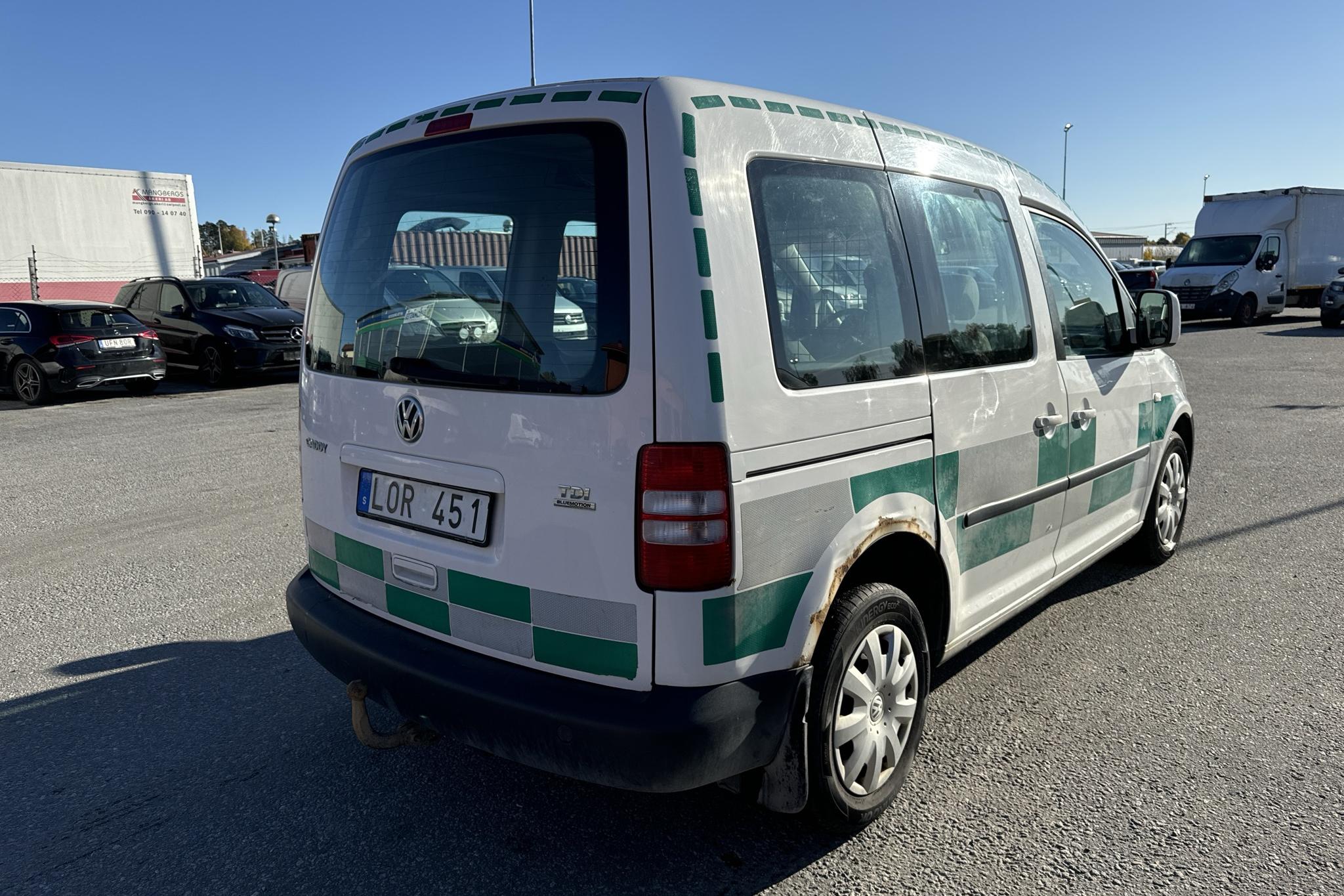 VW Caddy 1.6 TDI (75hk) - 197 620 km - Manualna - biały - 2013