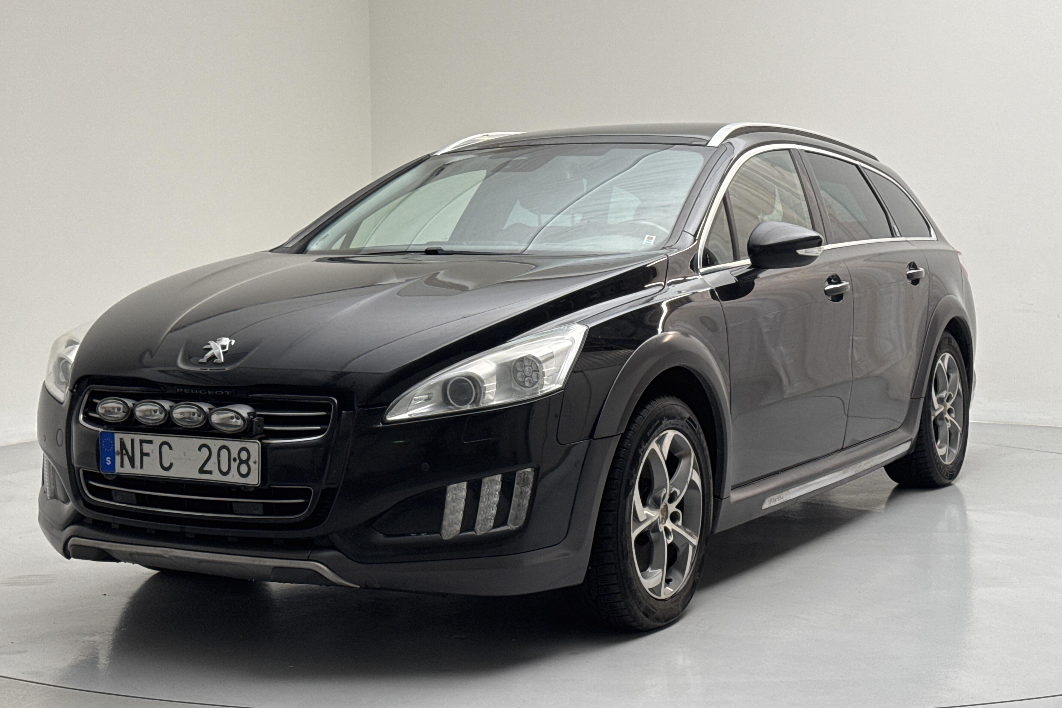 Peugeot 508 Hybrid4 RXH (163hk) - 236 410 km - Automaattinen - musta - 2013