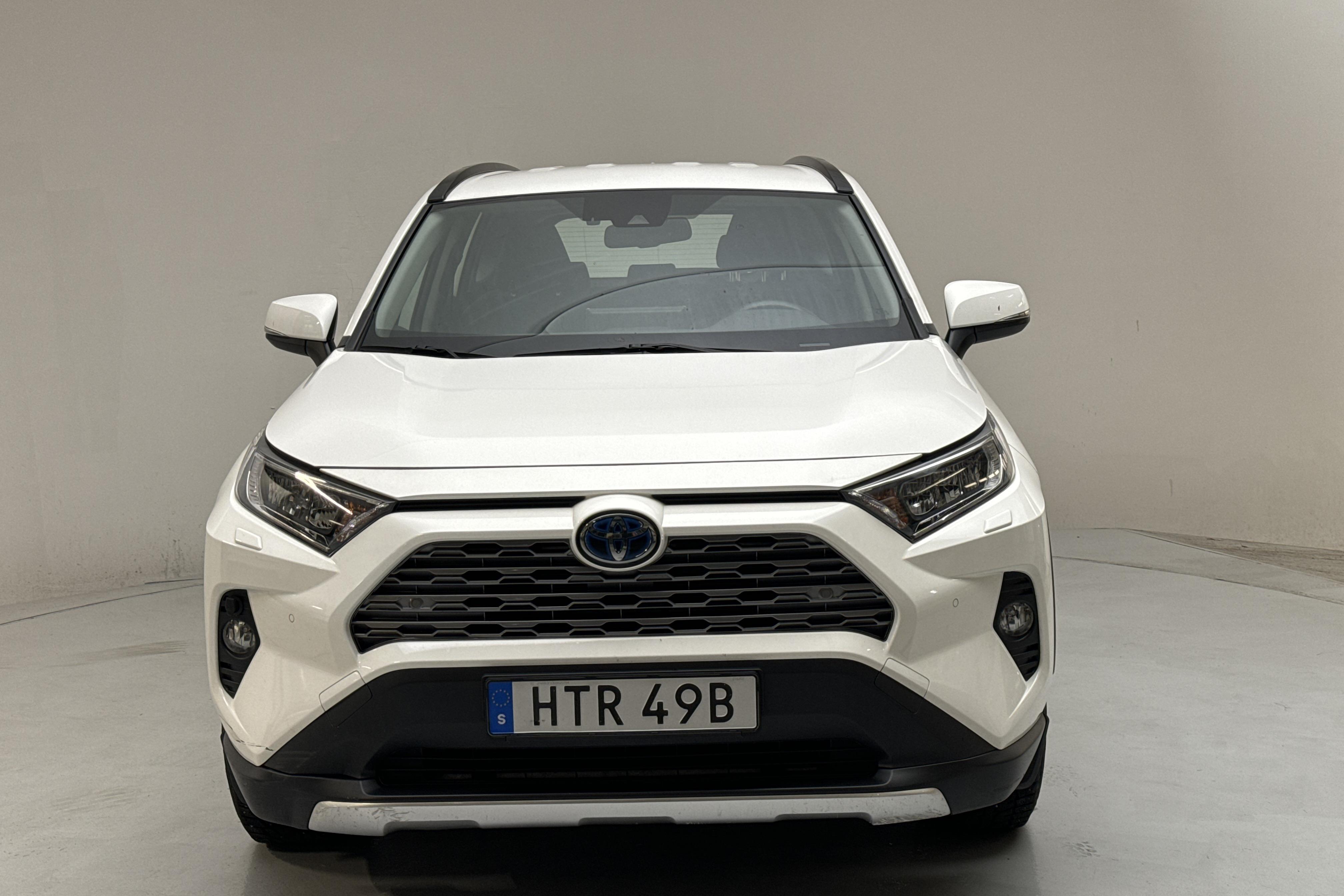 Toyota RAV4 2.5 HSD AWD (222hk) - 106 520 km - Automatyczna - biały - 2021