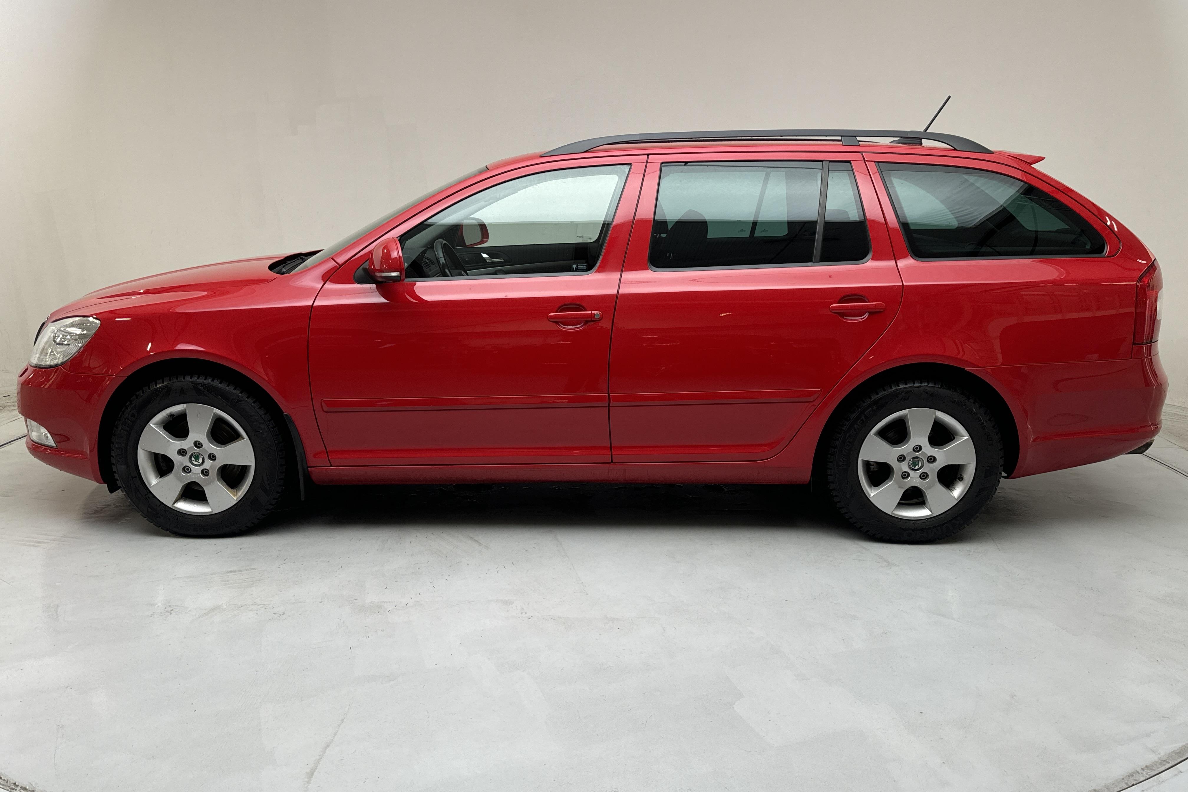 Skoda Octavia II 1.6 TDI GreenLine Kombi (105hk) - 159 760 km - Manualna - czerwony - 2013