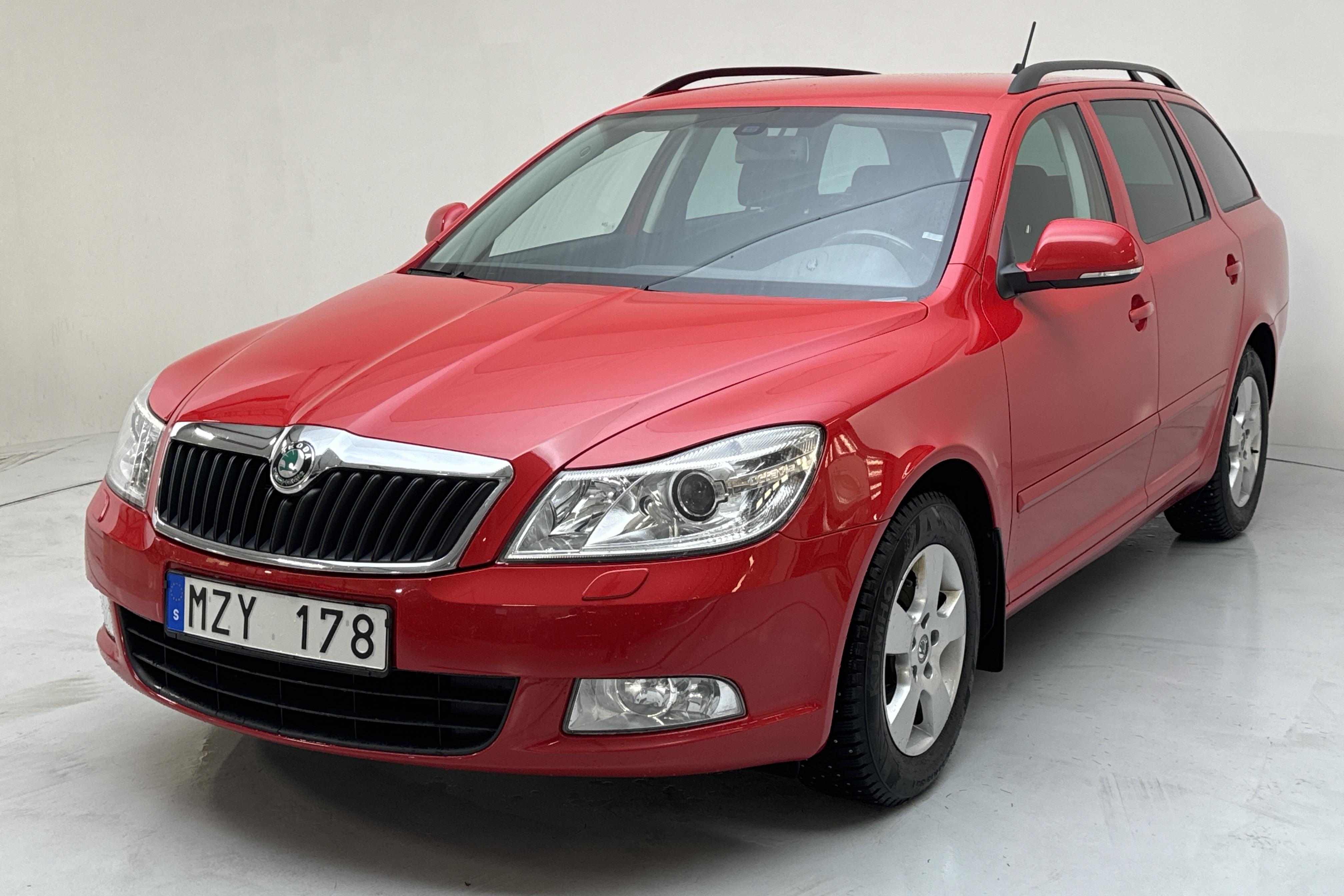 Skoda Octavia II 1.6 TDI GreenLine Kombi (105hk) - 159 760 km - Manualna - czerwony - 2013