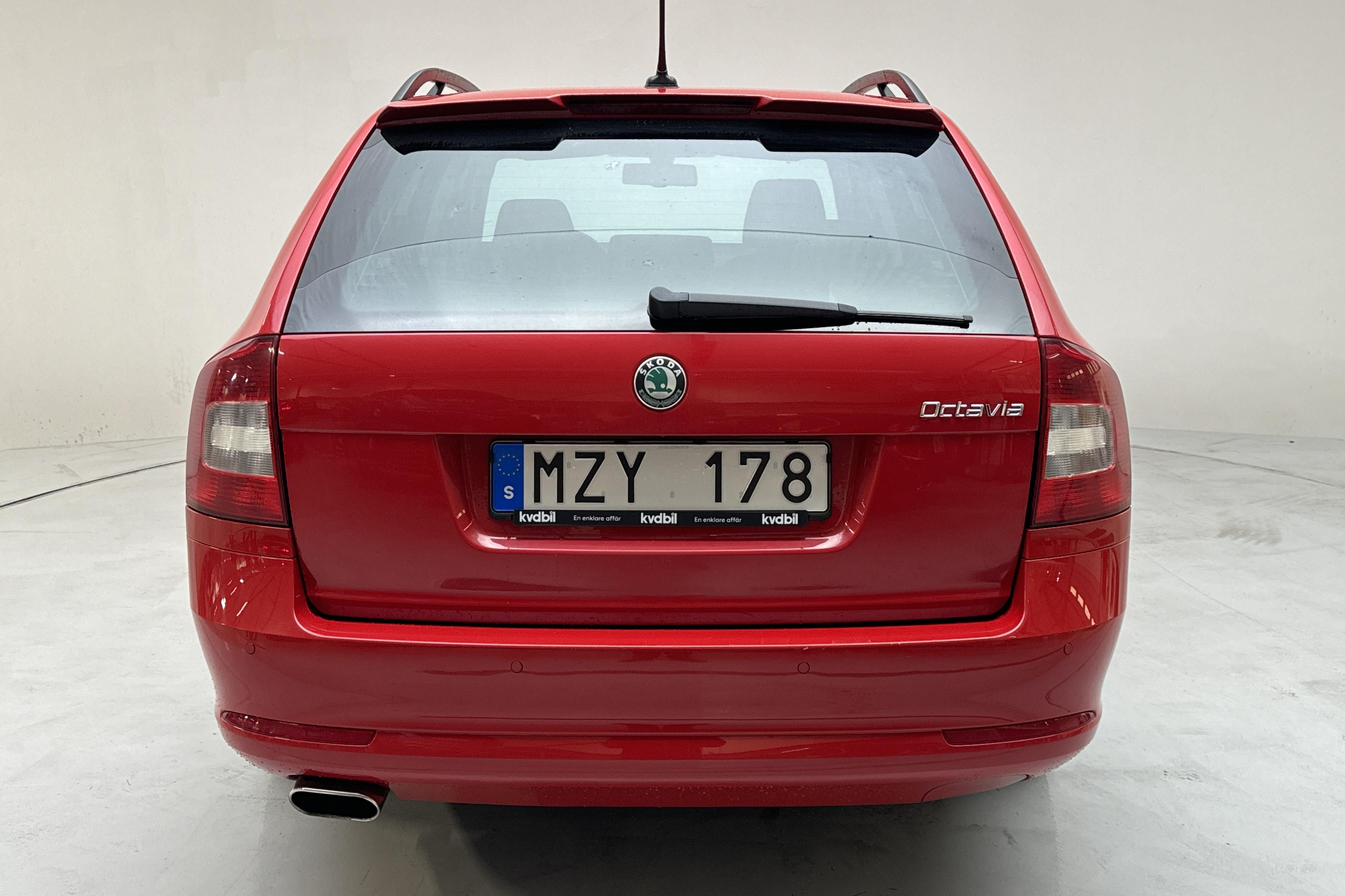 Skoda Octavia II 1.6 TDI GreenLine Kombi (105hk) - 159 760 km - Manualna - czerwony - 2013