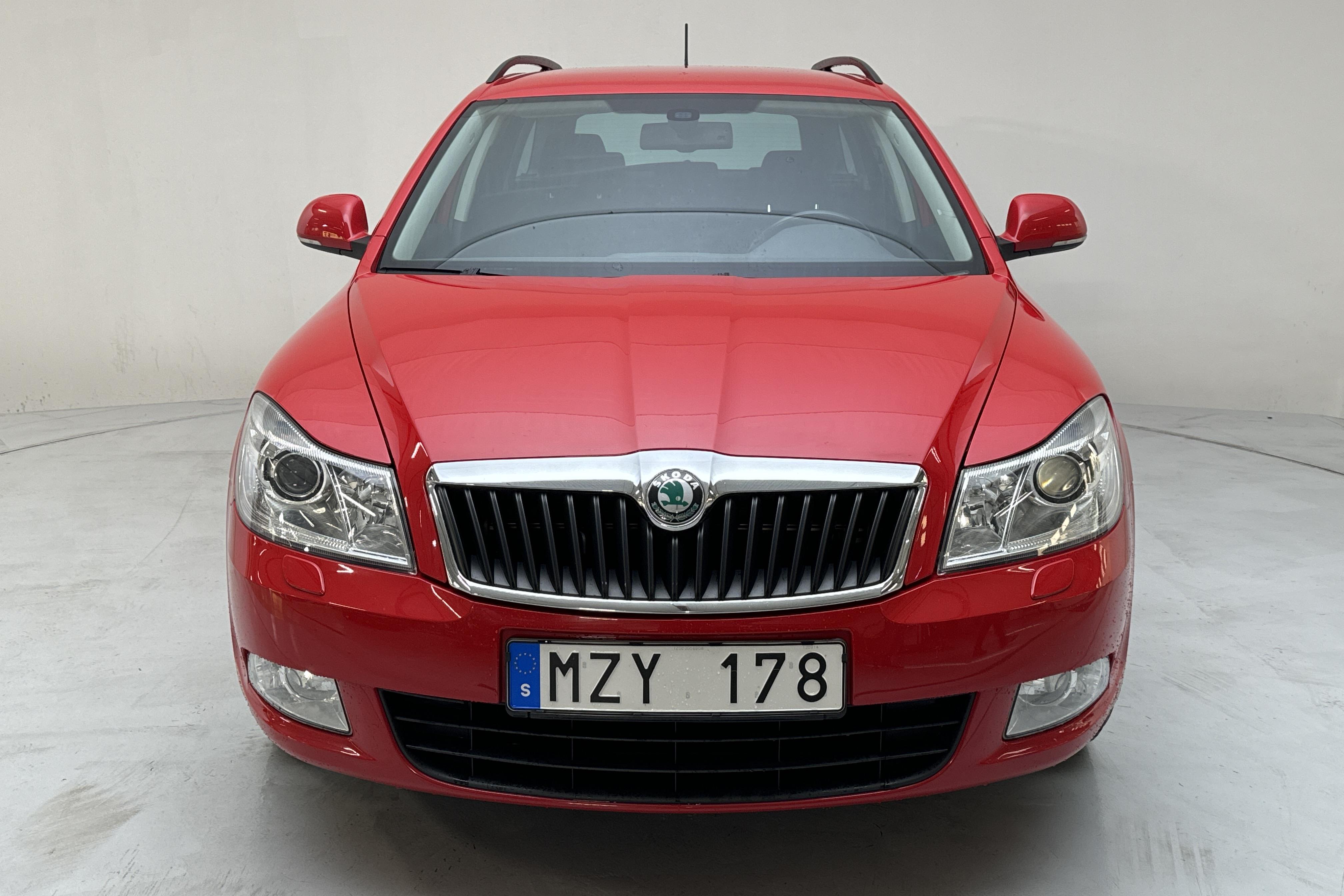 Skoda Octavia II 1.6 TDI GreenLine Kombi (105hk) - 159 760 km - Manualna - czerwony - 2013