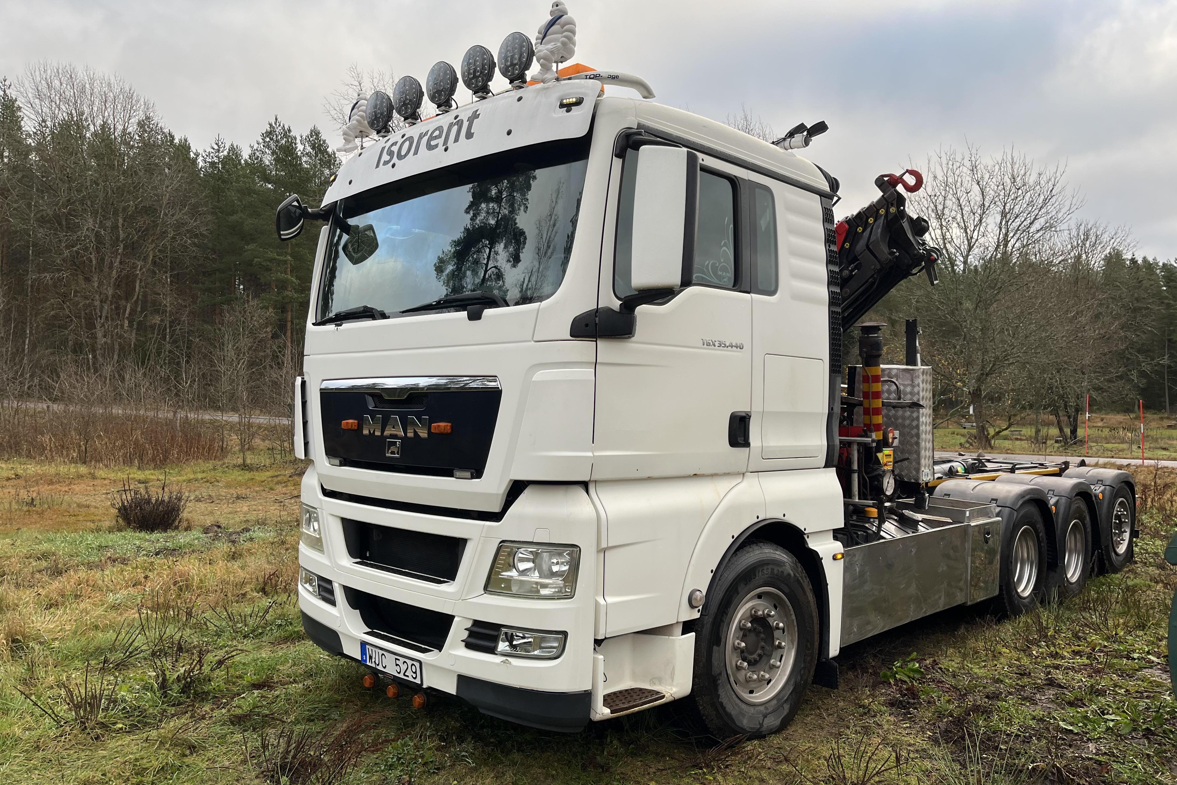 MAN TGX 35.440 8X4-4 BL - 389 065 km - Automatic - white - 2012