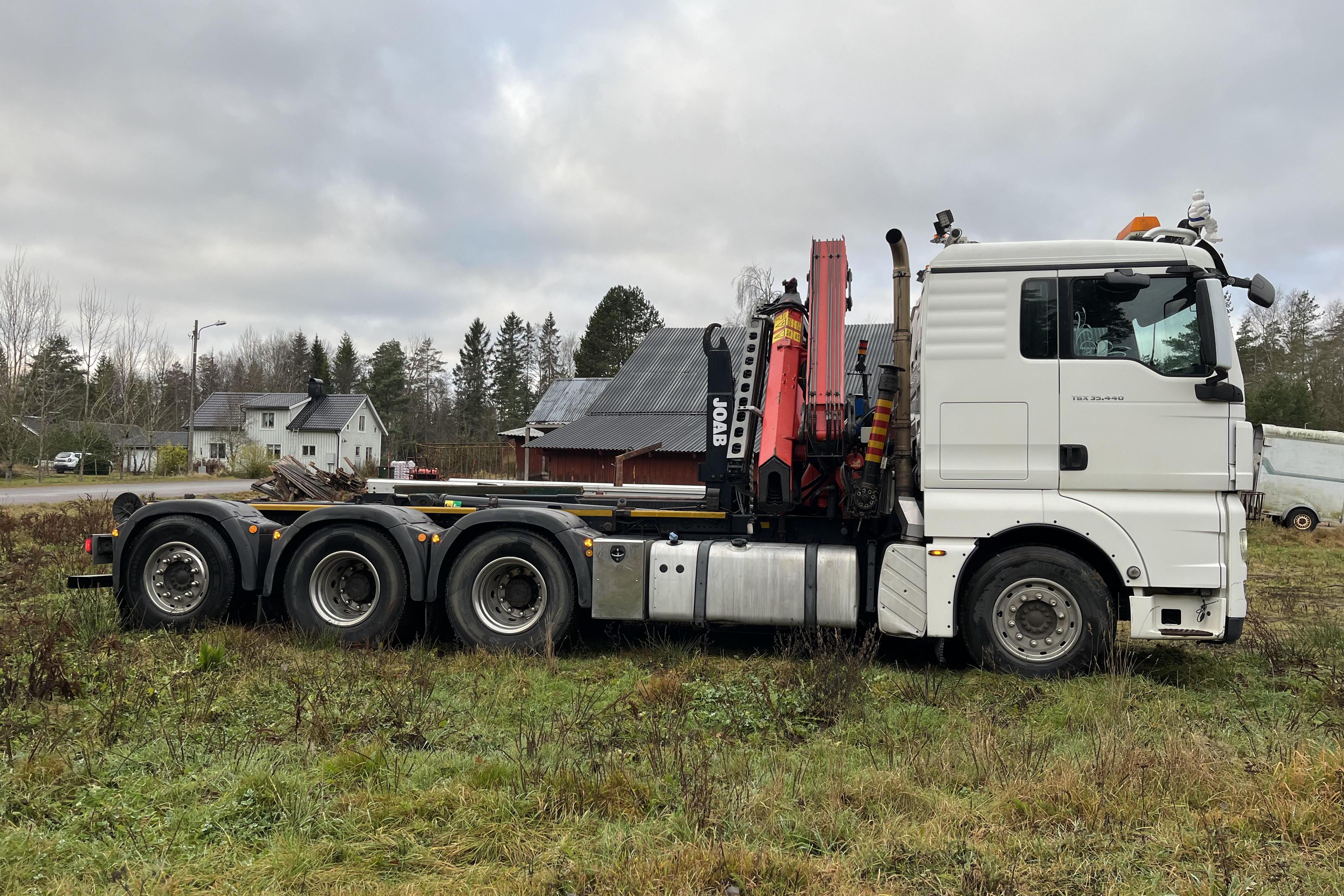 MAN TGX 35.440 8X4-4 BL - 389 065 km - Automatic - white - 2012