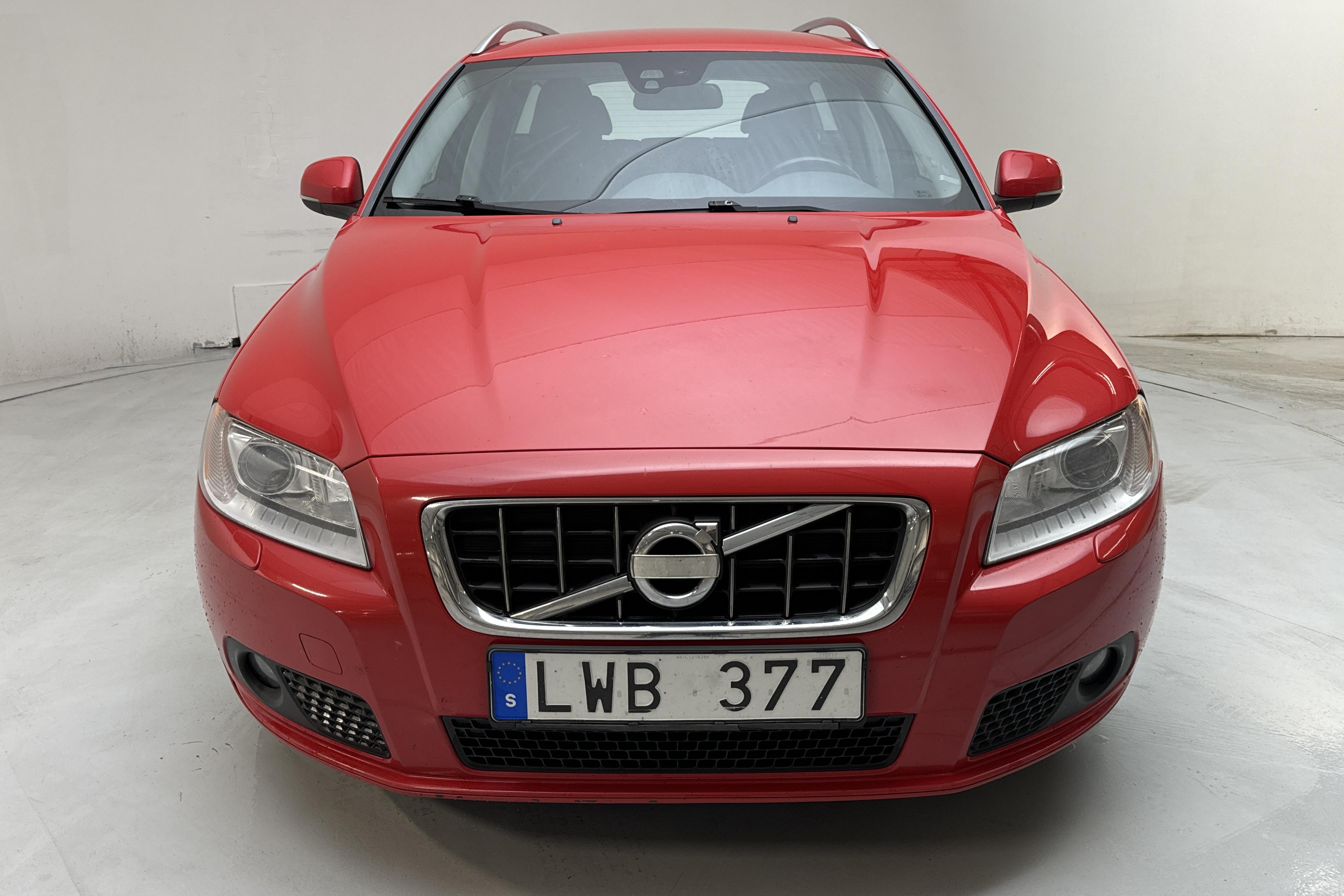 Volvo V70 II 1.6D DRIVe (115hk) - 302 490 km - Käsitsi - punane - 2012