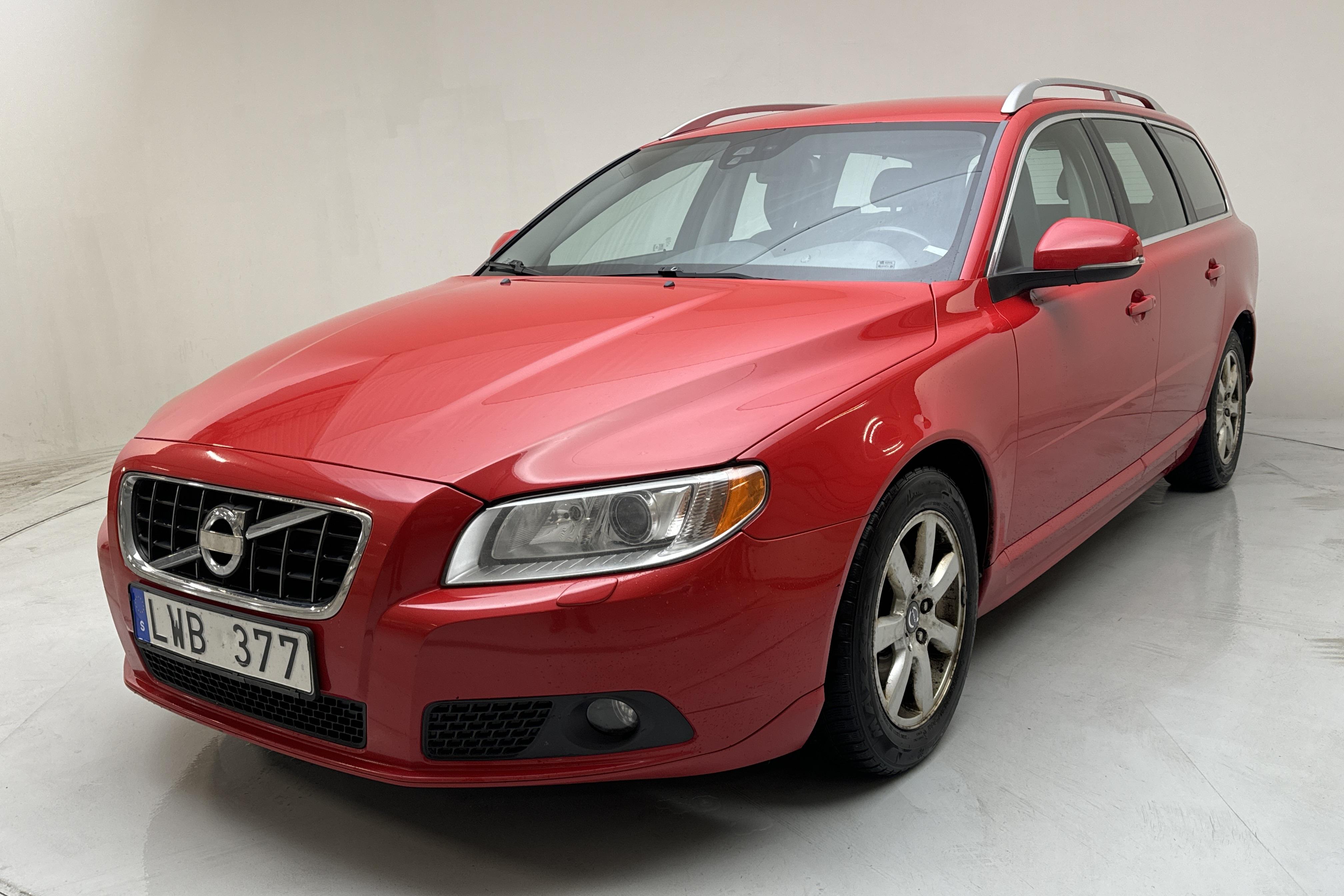 Volvo V70 II 1.6D DRIVe (115hk) - 302 490 km - Käsitsi - punane - 2012