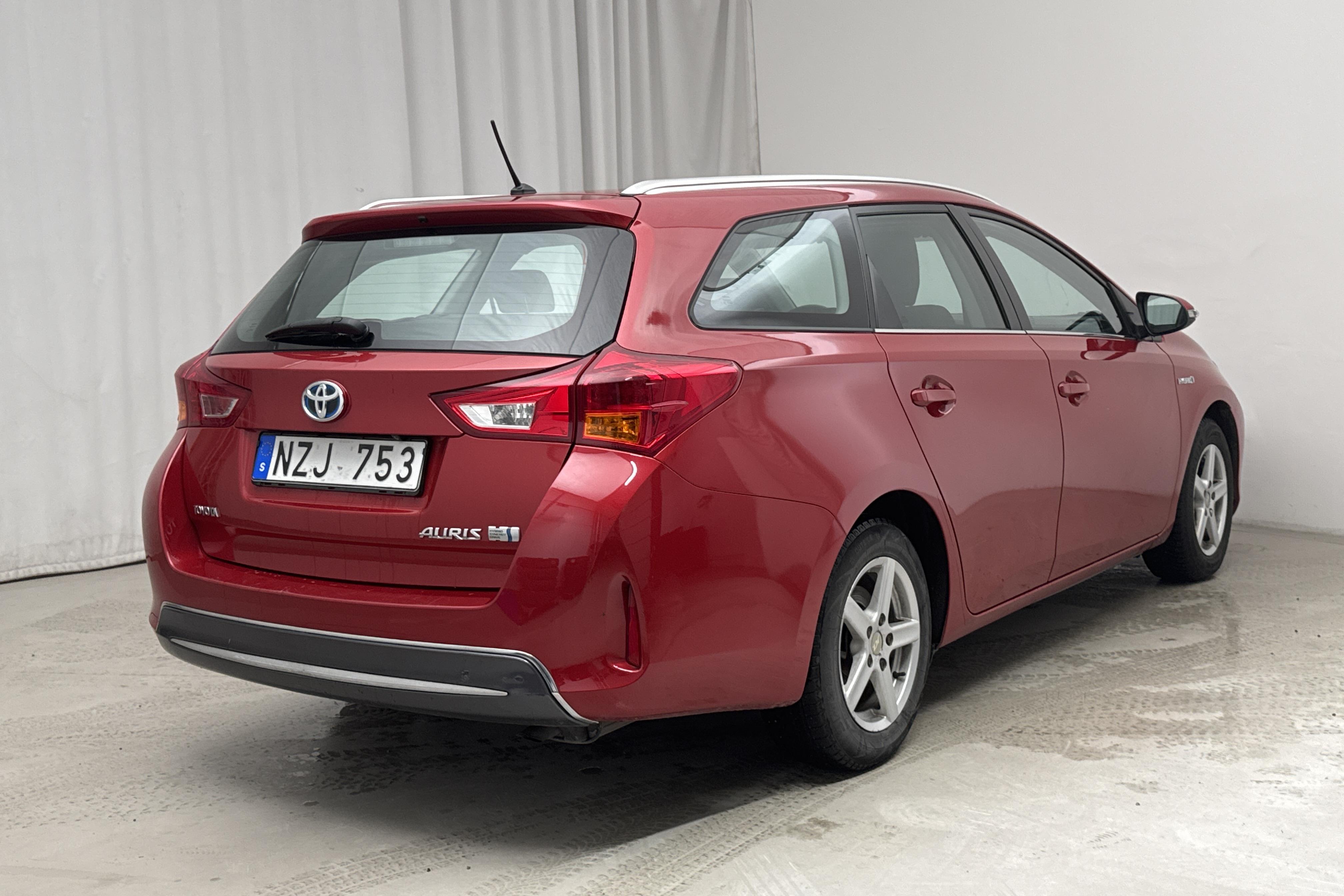 Toyota Auris 1.8 HSD Touring Sports (99hk) - 236 280 km - Automatyczna - Dark Red - 2013