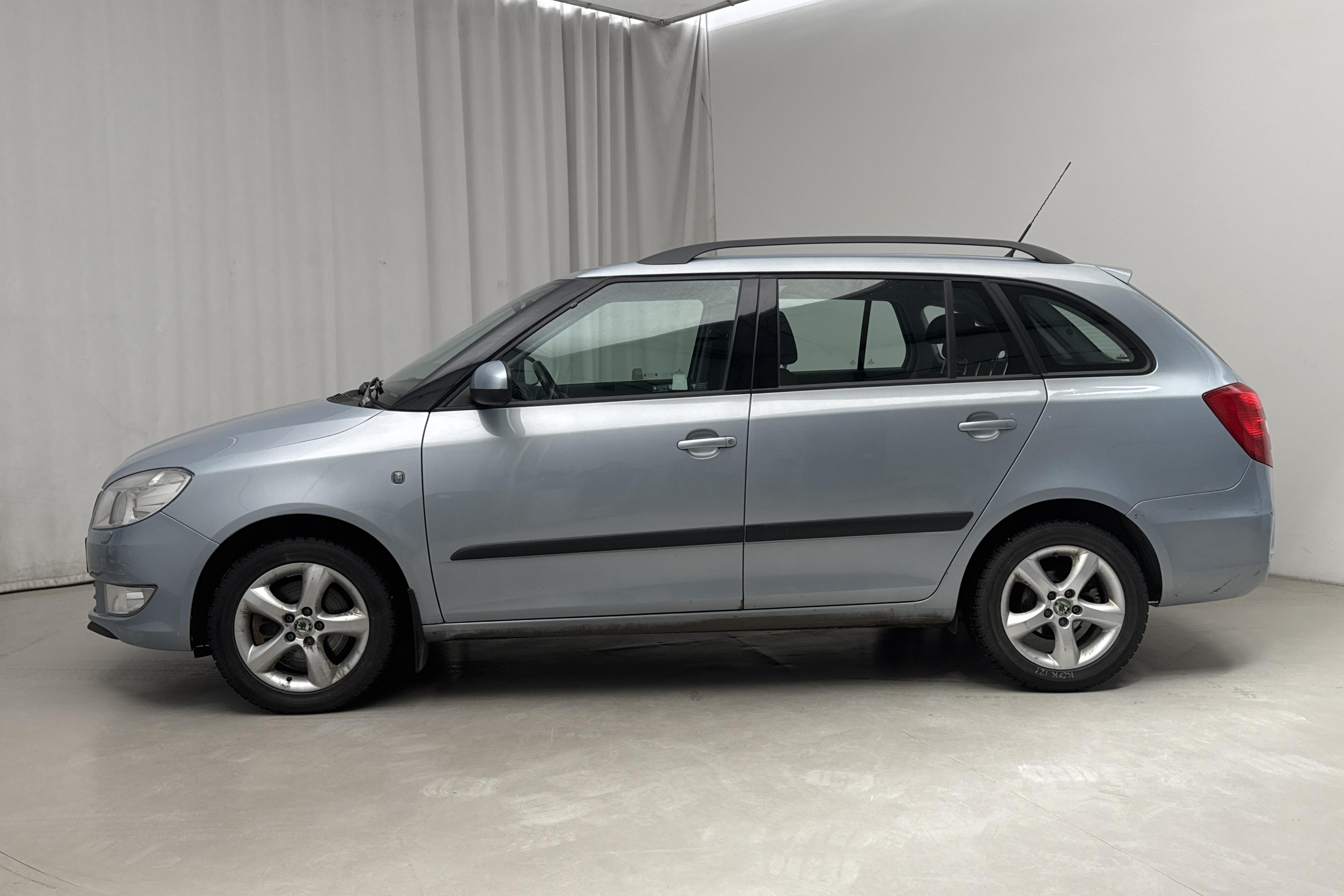 Skoda Fabia 1.2 TSI Combi (105hk) - 97 330 km - Automatyczna - Light Blue - 2011