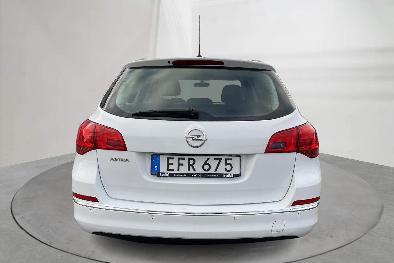 Opel Astra 1.6 ECOTEC Sports Tourer (115hk) - 147 190 km - Manuaalinen - valkoinen - 2014