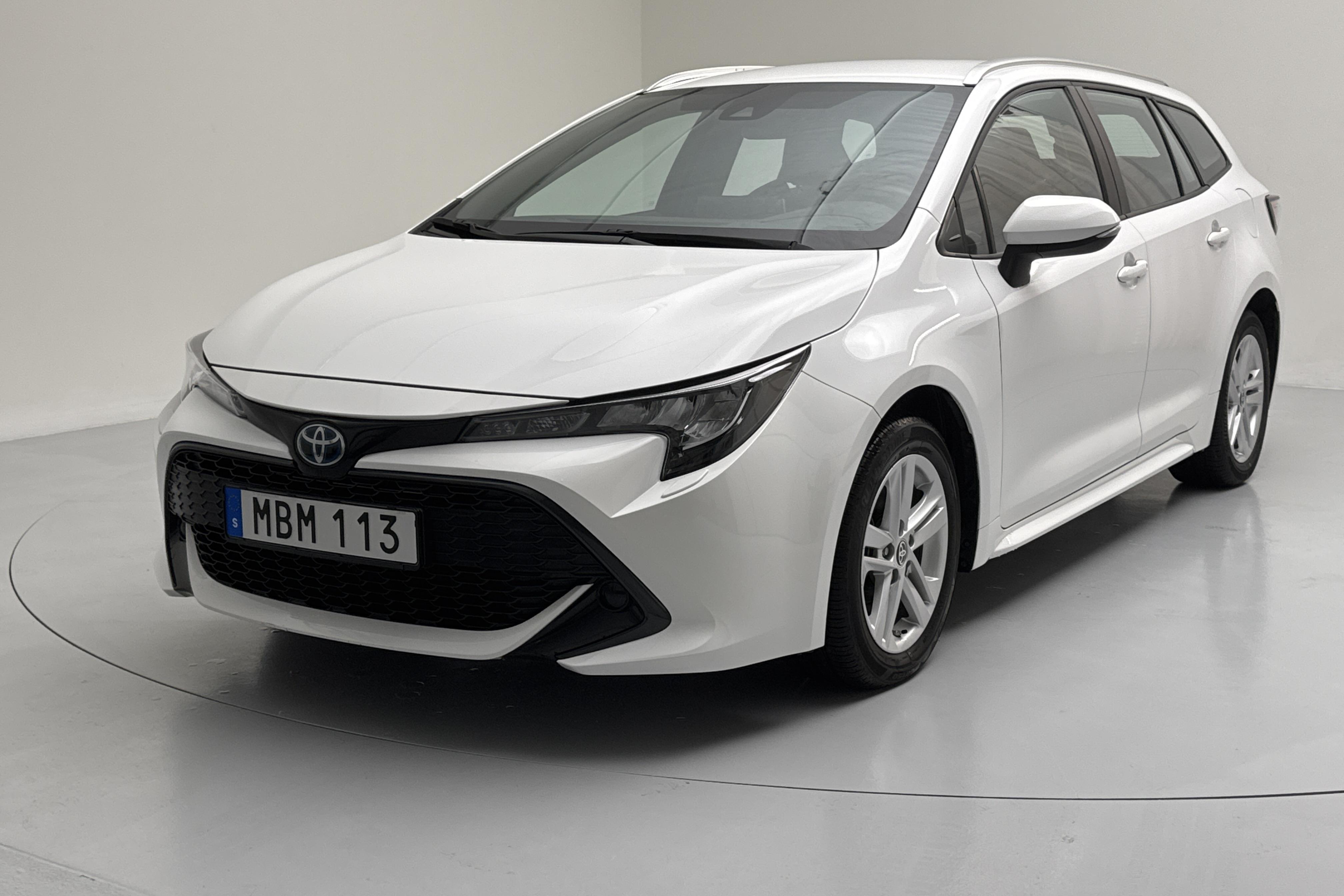 Toyota Corolla 1.8 Hybrid Touring Sports (122hk) - 14 360 km - Automatyczna - biały - 2022