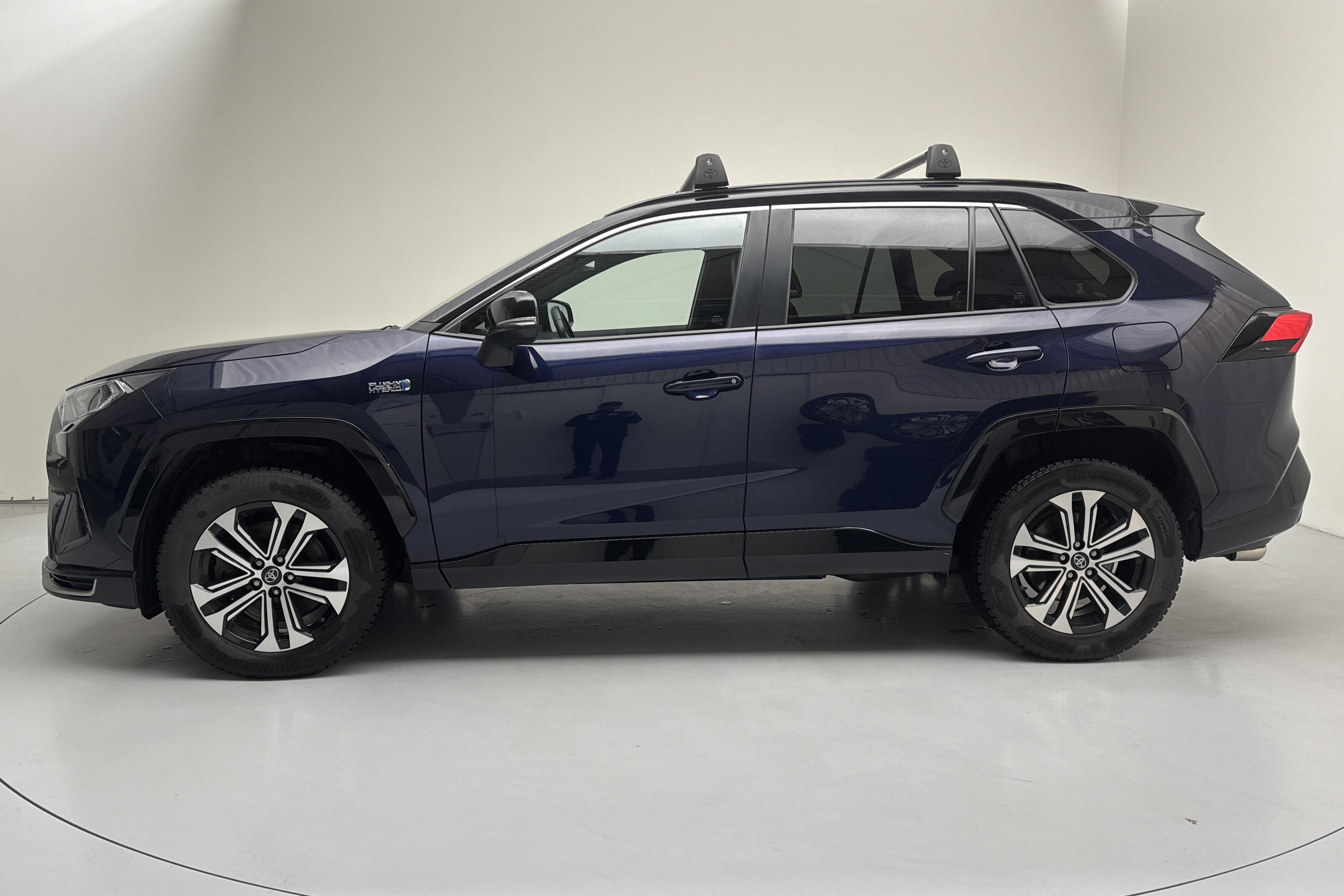 Toyota RAV4 2.5 Plug-in Hybrid AWD (306hk) - 76 400 km - Automatyczna - niebieski - 2021