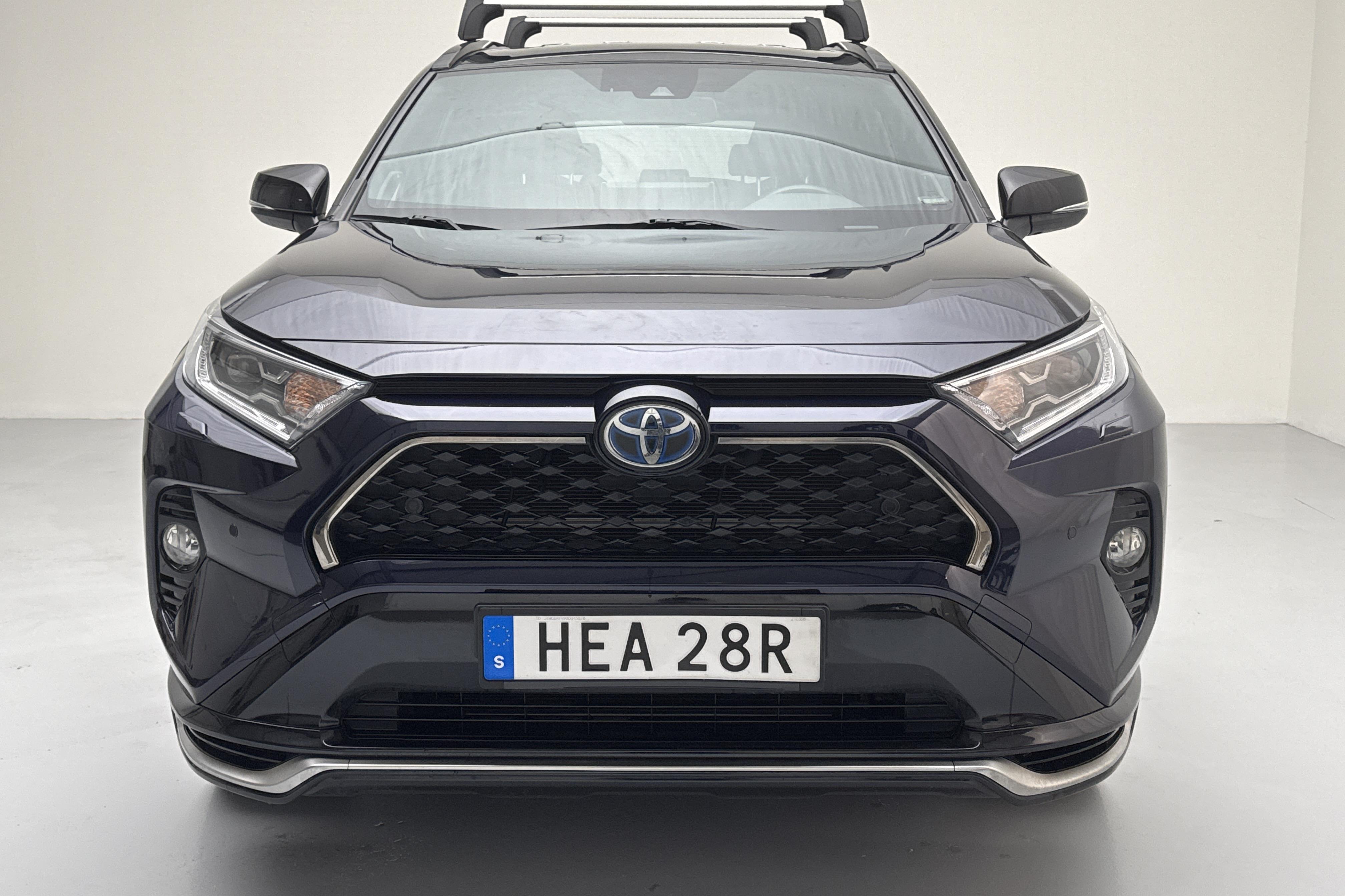 Toyota RAV4 2.5 Plug-in Hybrid AWD (306hk) - 76 400 km - Automatyczna - niebieski - 2021