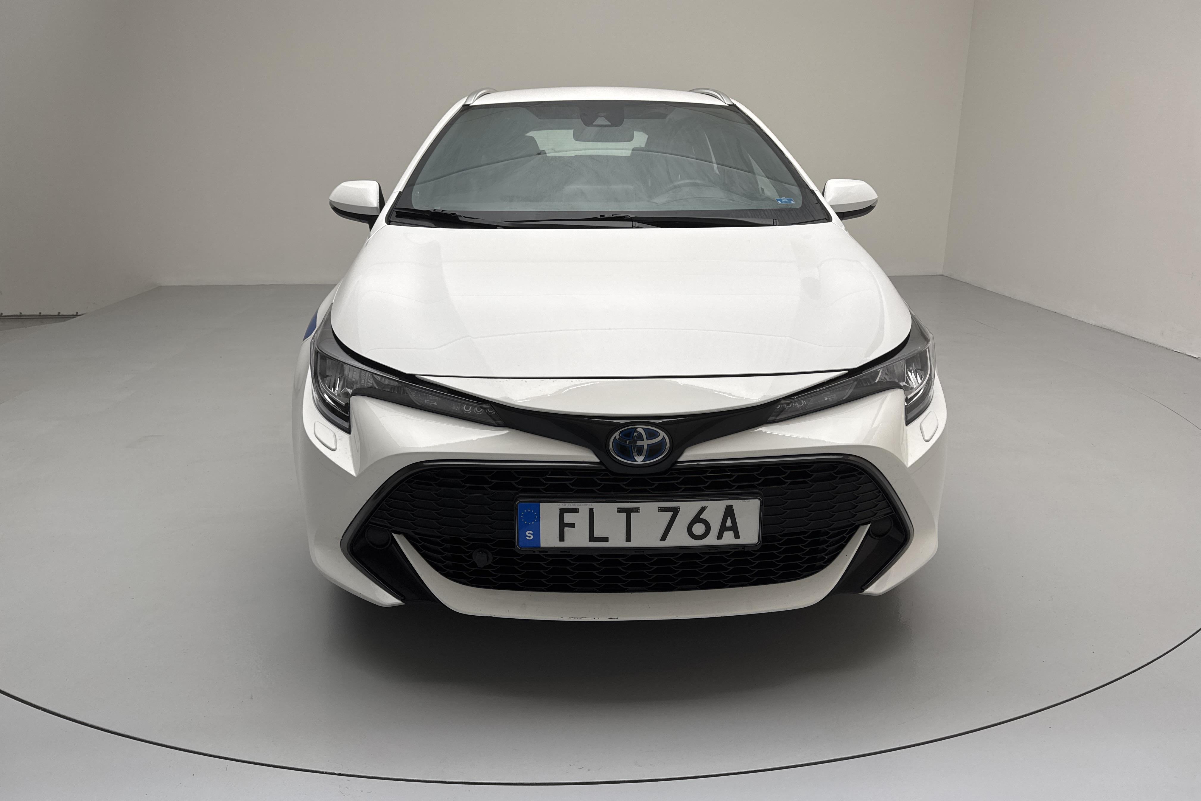 Toyota Corolla 1.8 Hybrid Touring Sports (122hk) - 7 407 mil - Automat - vit - 2021