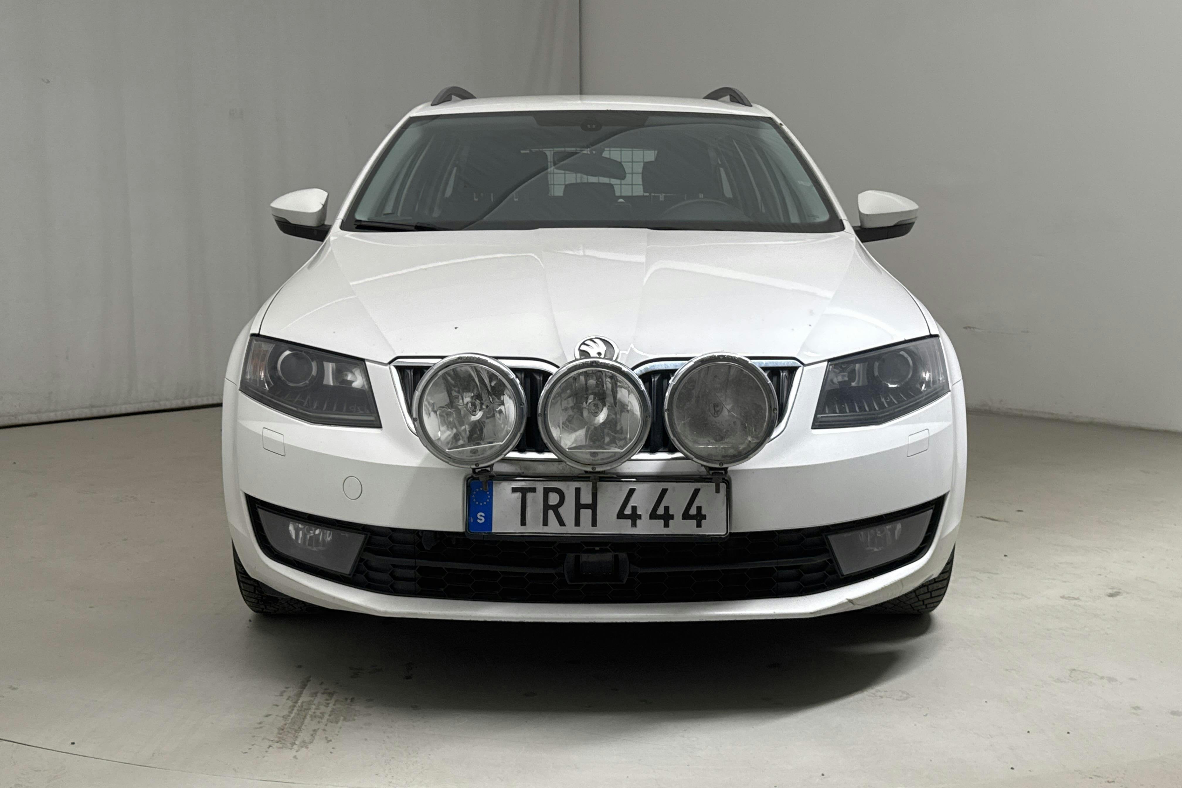 Skoda Octavia III 1.6 TDI CR Combi 4X4 (105hk) - 221 550 km - Manual - white - 2014