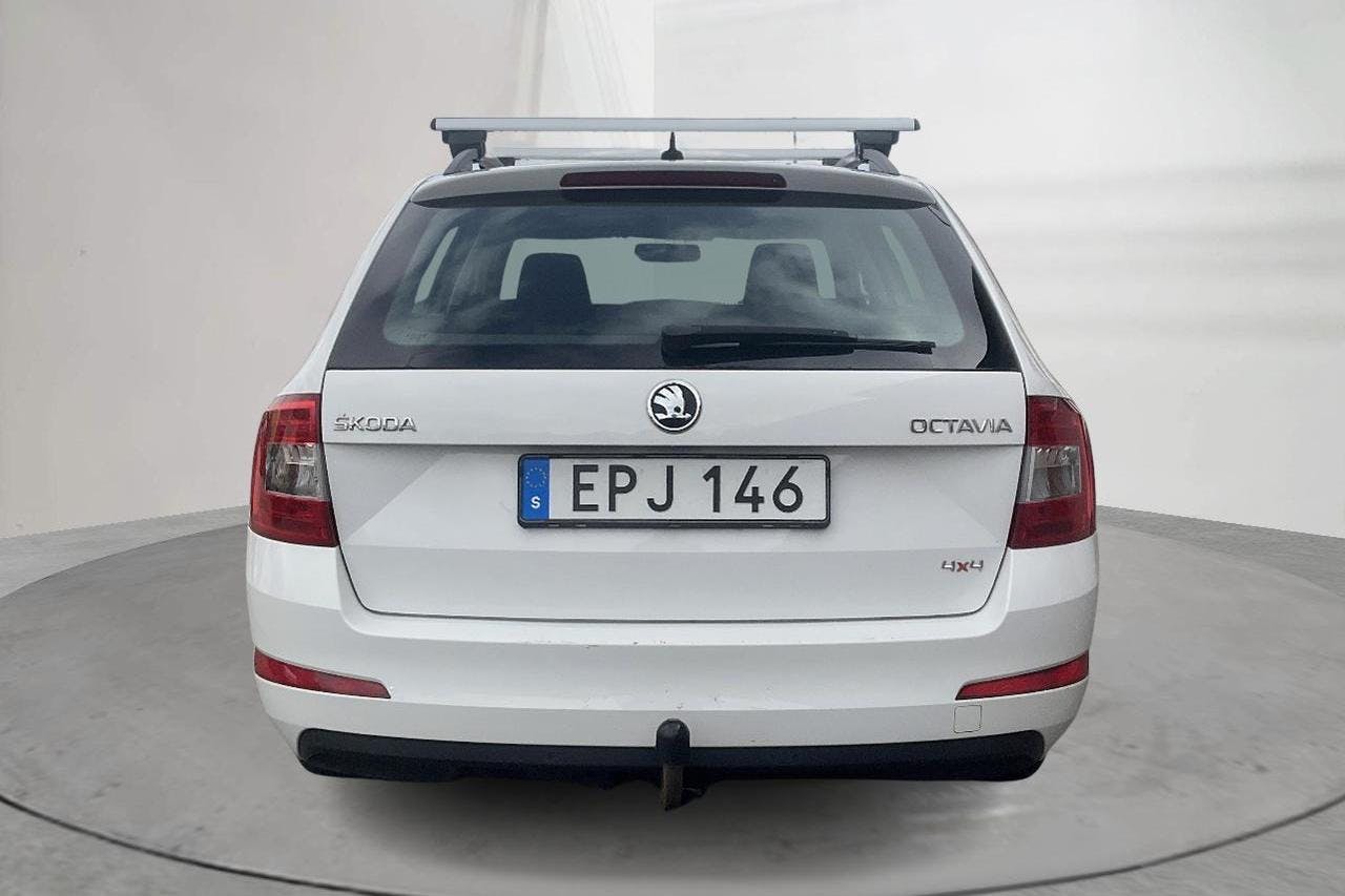 Skoda Octavia III 1.6 TDI CR Combi 4X4 (105hk) - 84 810 km - Manual - white - 2015