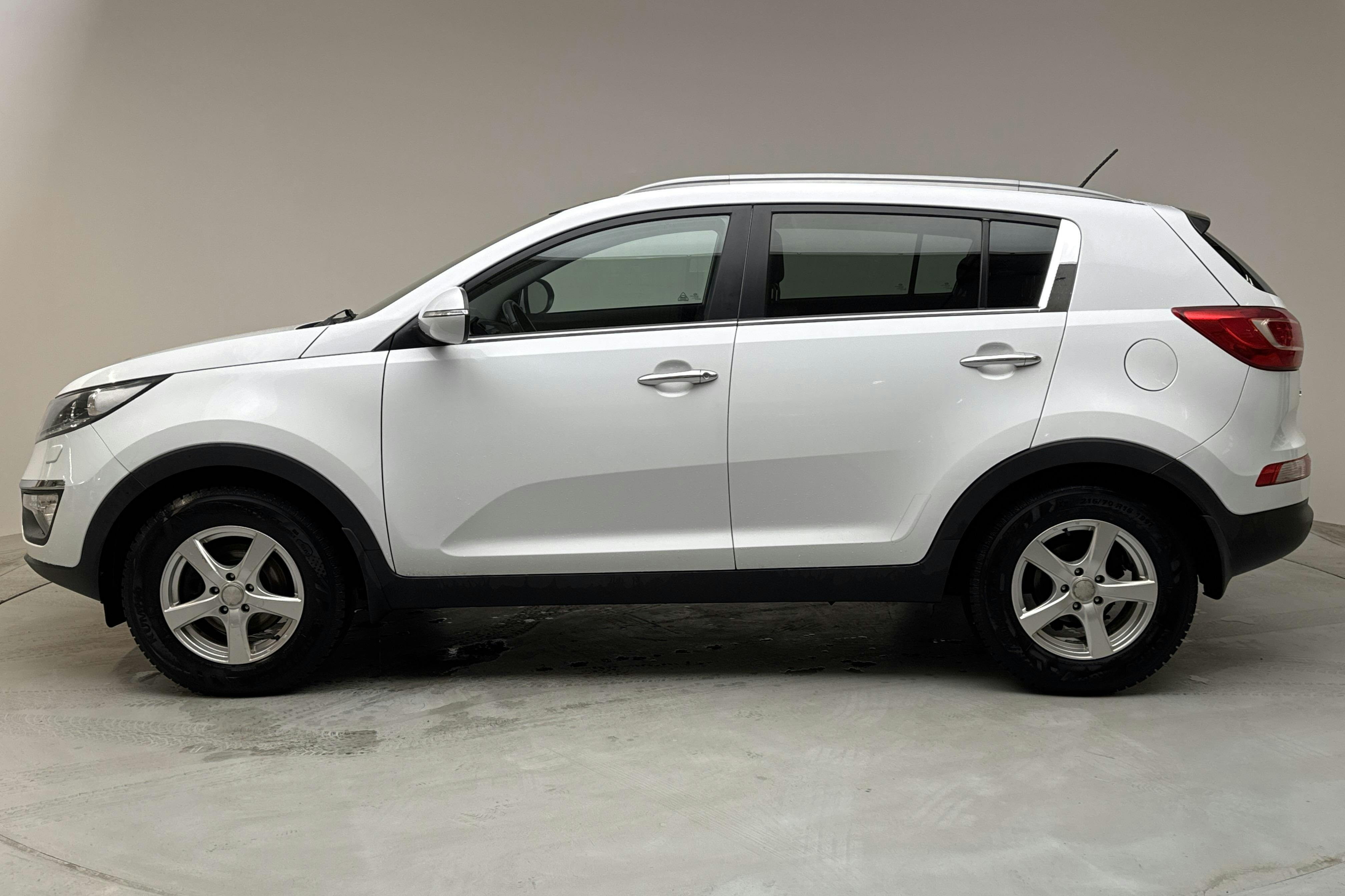 KIA Sportage 1.7 CRDi 2WD (115hk) - 148 510 km - Manualna - biały - 2013