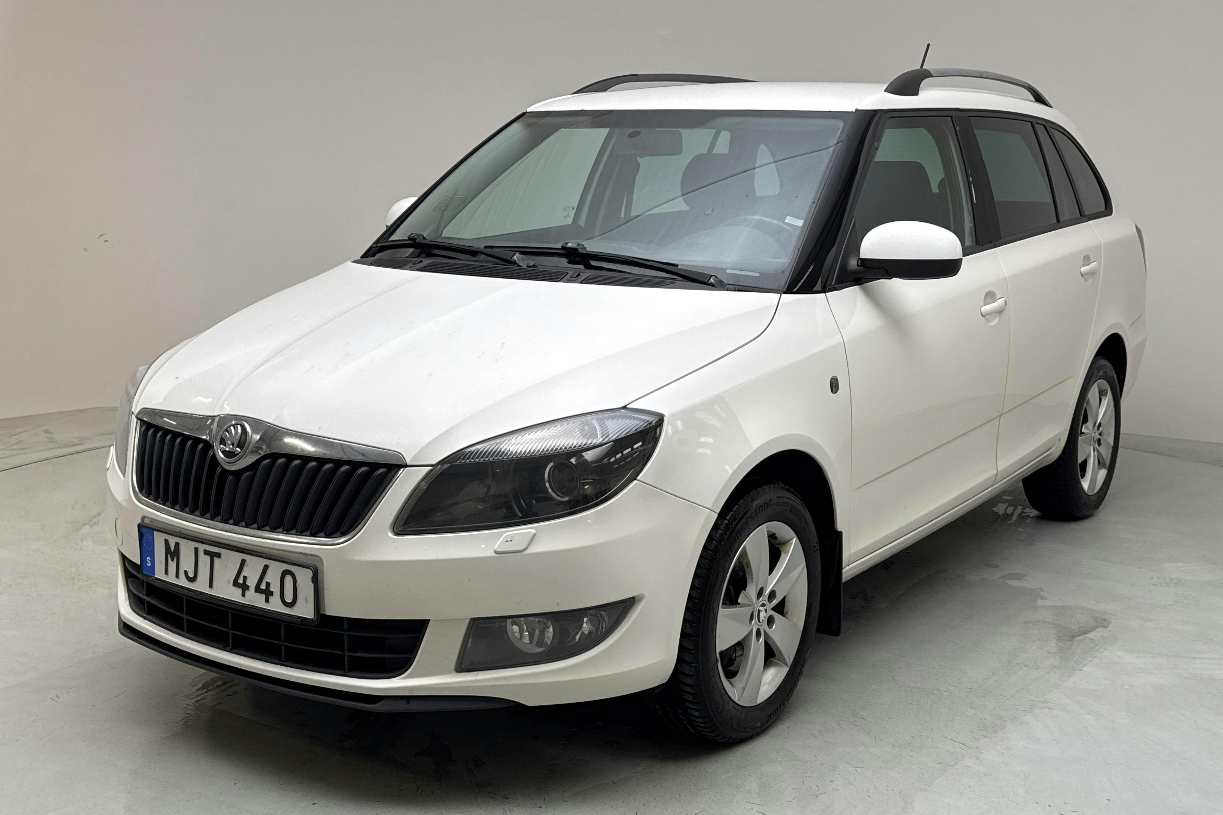 Skoda Fabia 1.2 TSI Combi (105hk) - 207 260 km - Käsitsi - valge - 2014