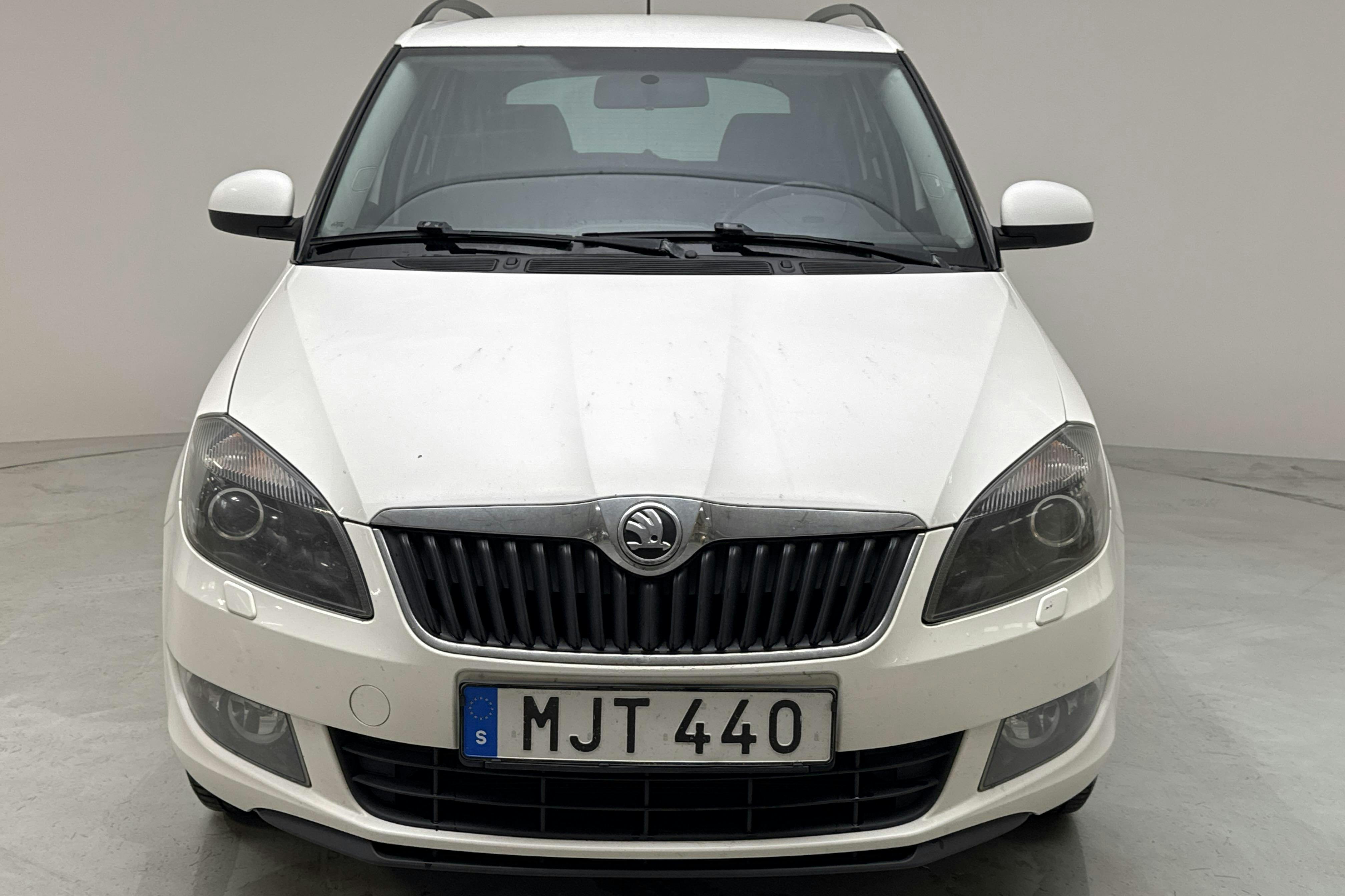Skoda Fabia 1.2 TSI Combi (105hk) - 207 260 km - Käsitsi - valge - 2014