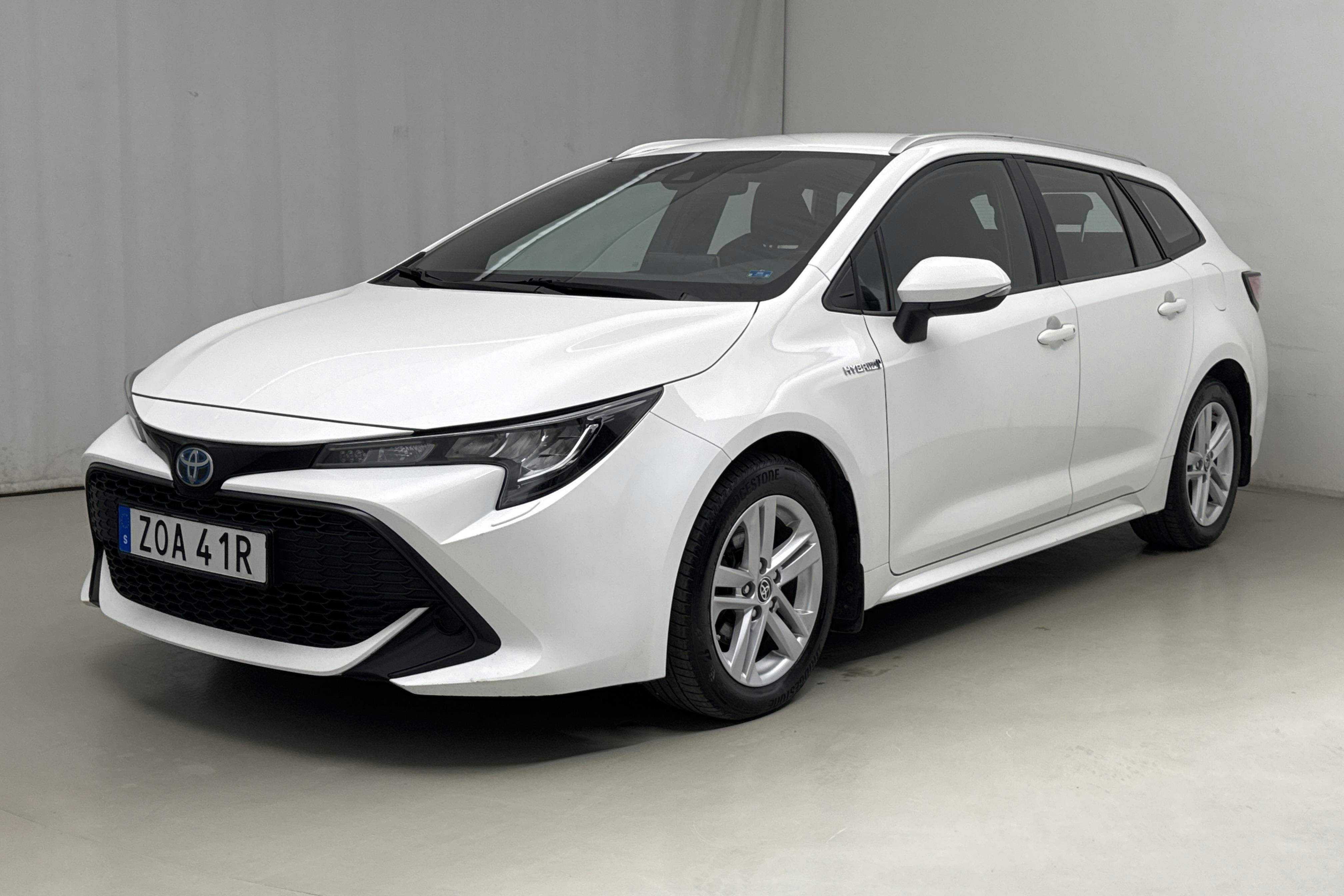 Toyota Corolla 1.8 Hybrid Touring Sports (122hk) - 123 690 km - Automaattinen - valkoinen - 2021