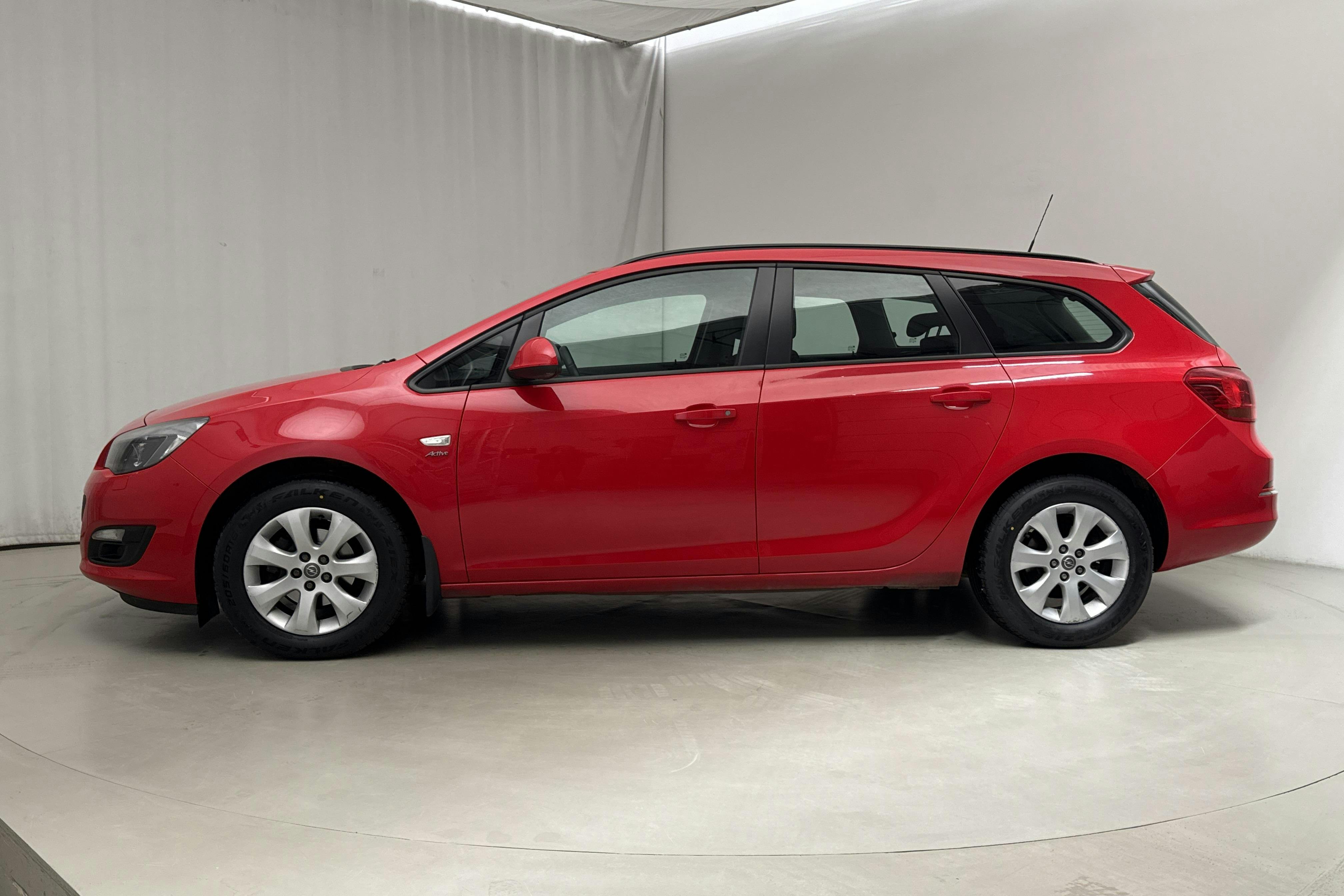 Opel Astra 1.6 ECOTEC Sports Tourer (115hk) - 7 194 mil - Manuell - röd - 2014