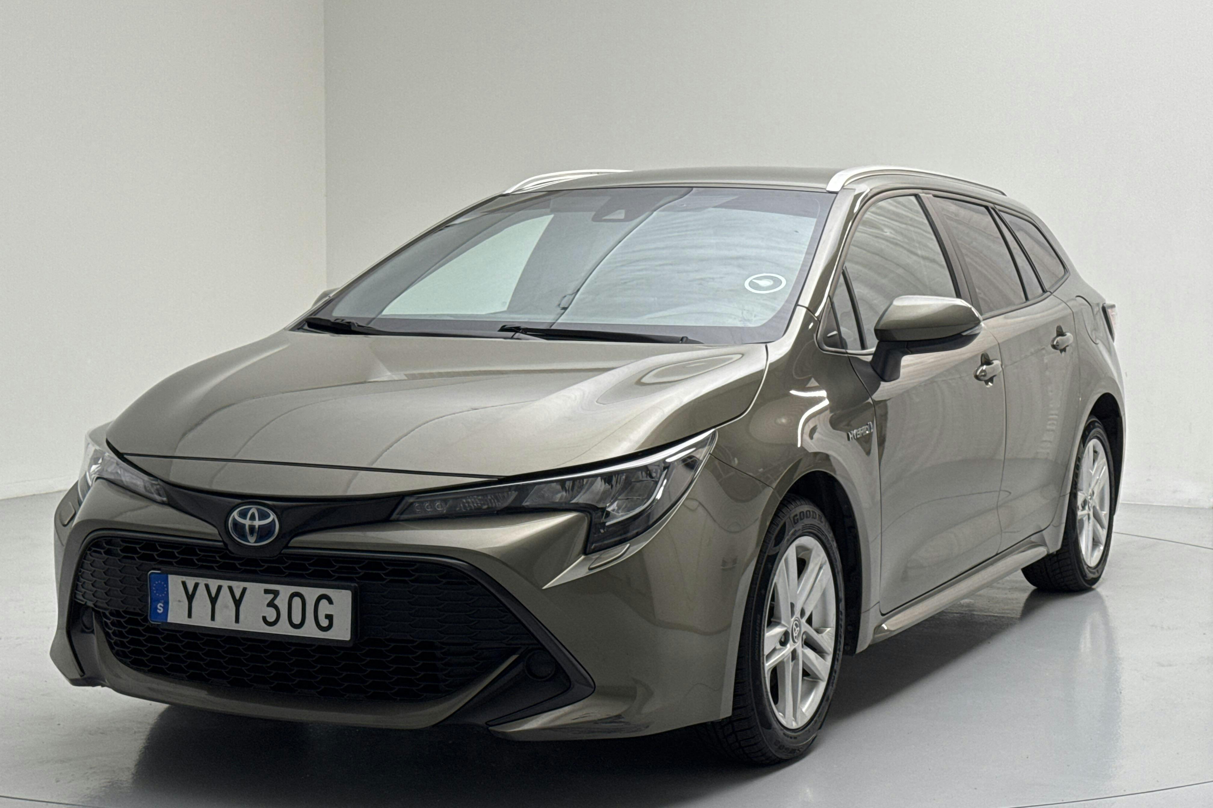Toyota Corolla 1.8 Hybrid Touring Sports (122hk) - 19 311 mil - Automat - grön - 2021