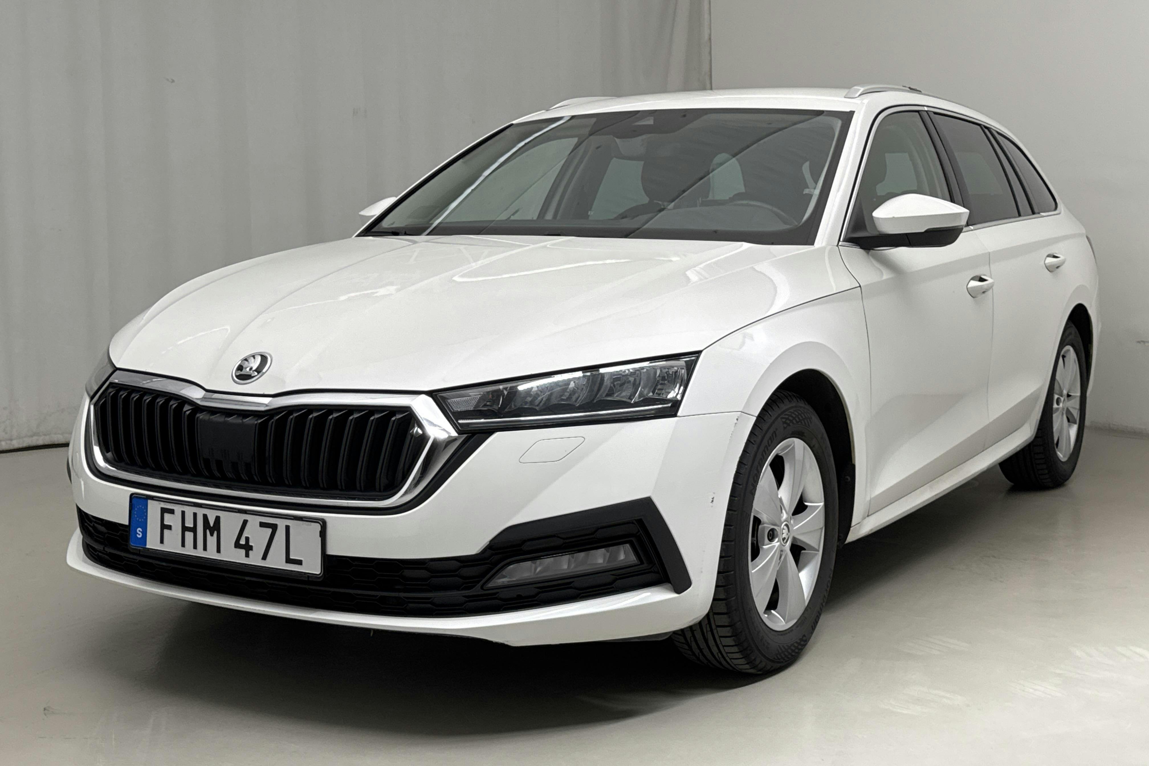 Presentation photo 1 of 16: Skoda Octavia G-TEC 1.5 TSI Combi (130hk) - 125 810 km - Automatic - white - 2021