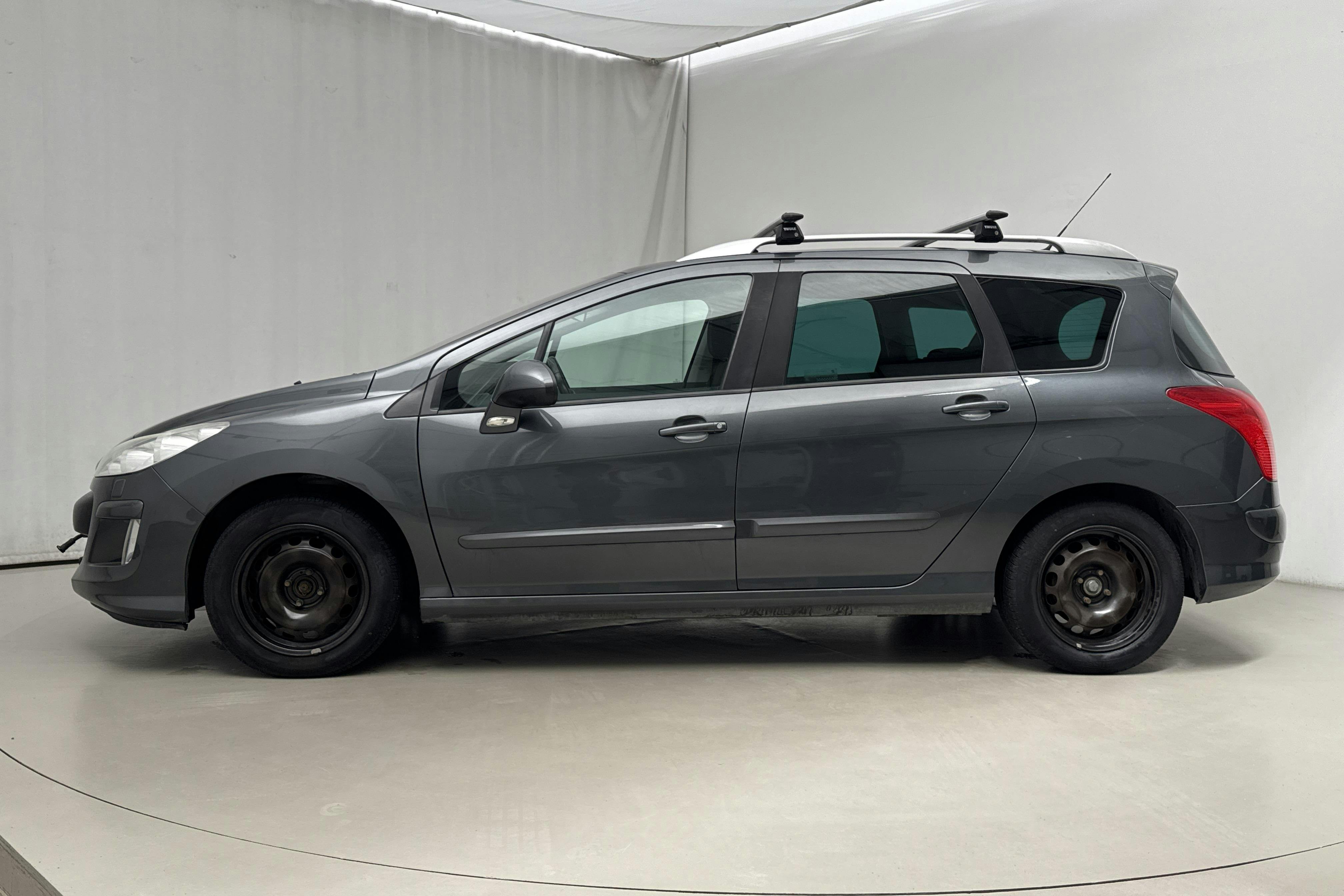 Presentation photo 2 of 15: Peugeot 308 SW 1.6 HDi FAP (110hk) - 165 210 km - Manual - Dark Grey - 2011
