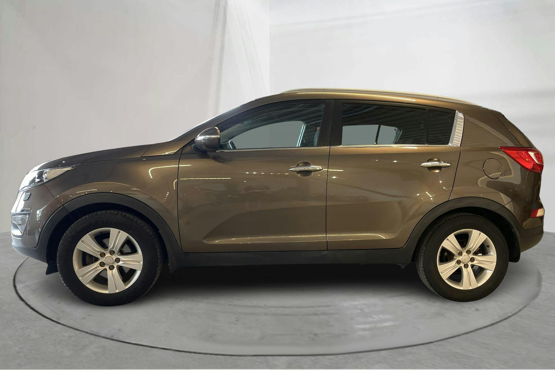 Presentationsfoto 2 av 14: KIA Sportage 1.7 CRDi 2WD (115hk) - 12 434 mil - Manuell - Light Brown - 2012