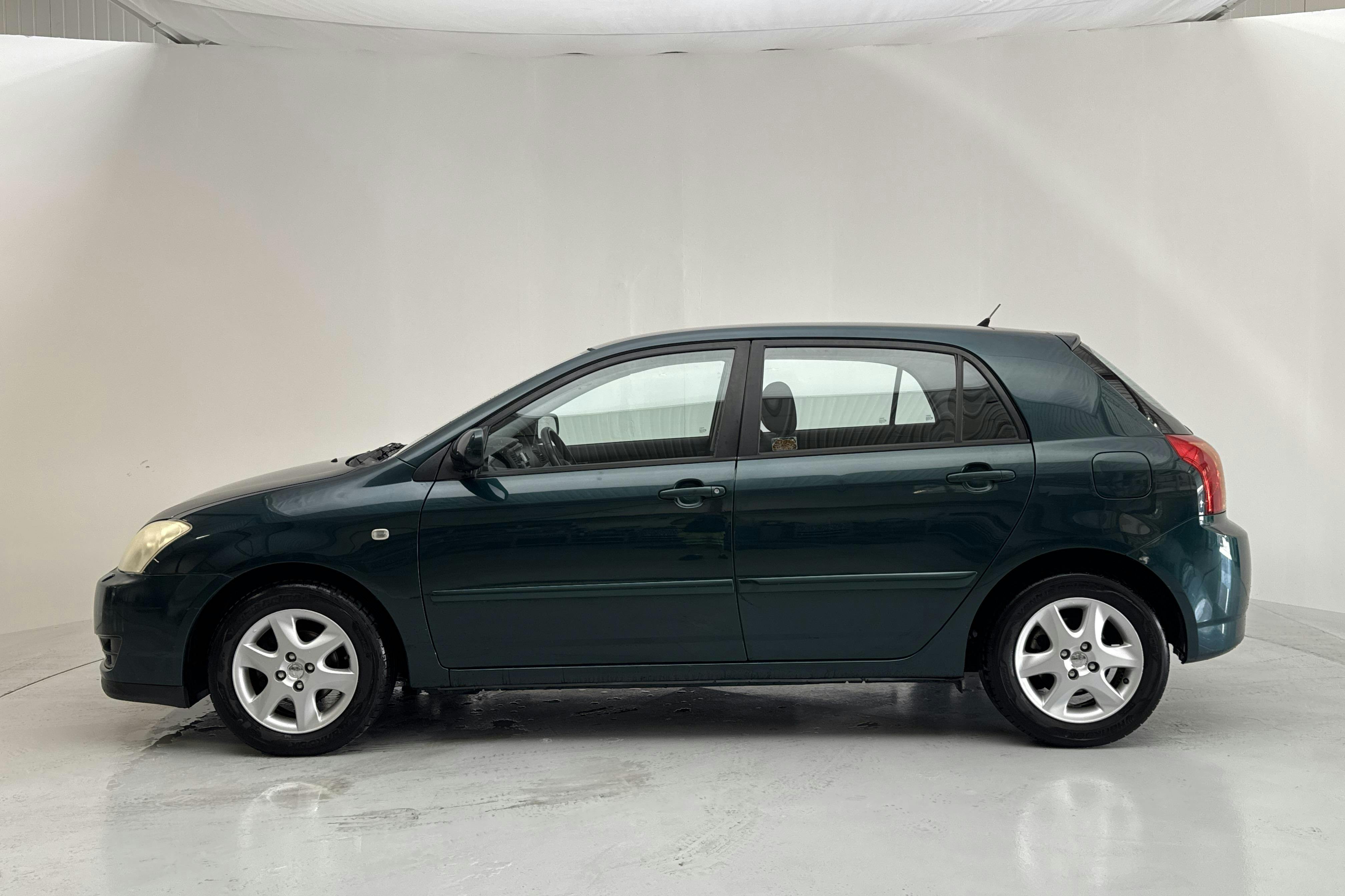 Presentation photo 2 of 12: Toyota Corolla 1.6 5dr (110hk) - 175 840 km - Manual - Dark Green - 2006