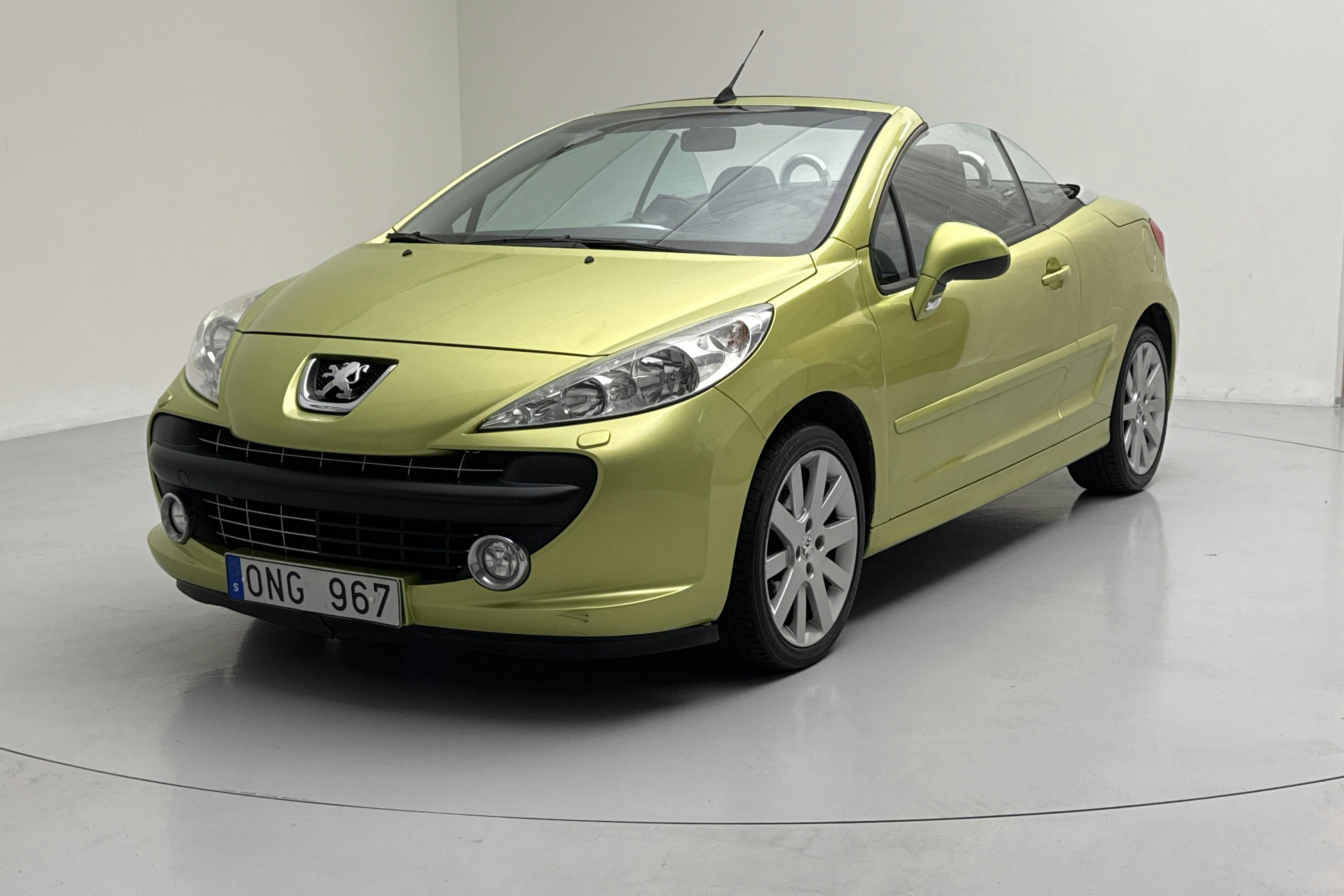Presentation photo 1 of 17: Peugeot 207 CC 1.6 VTi (120hk) - 113 490 km - Manual - yellow - 2009