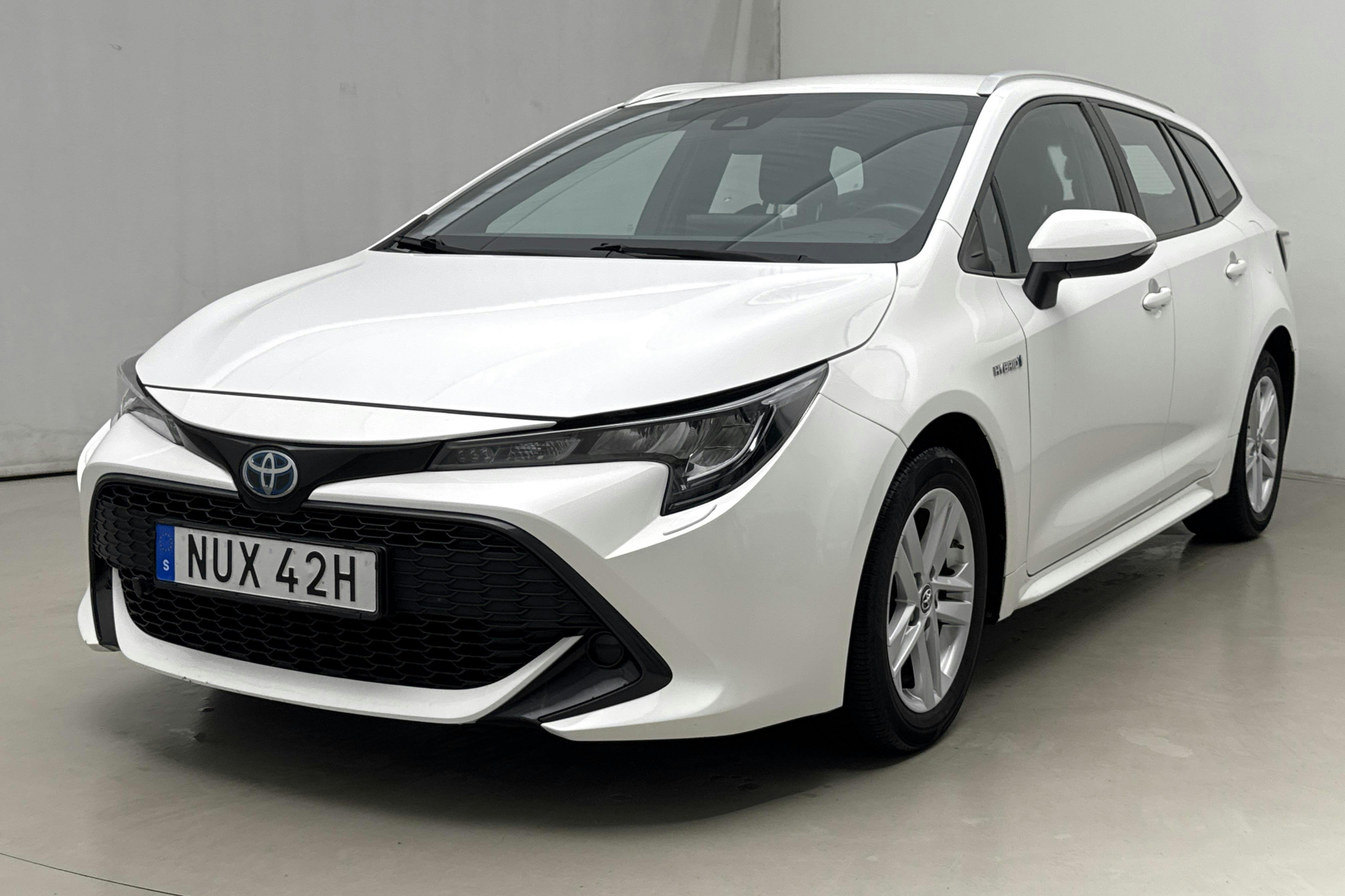 Toyota Corolla 1.8 Hybrid Touring Sports (122hk) - 7 168 mil - Automat - vit - 2019