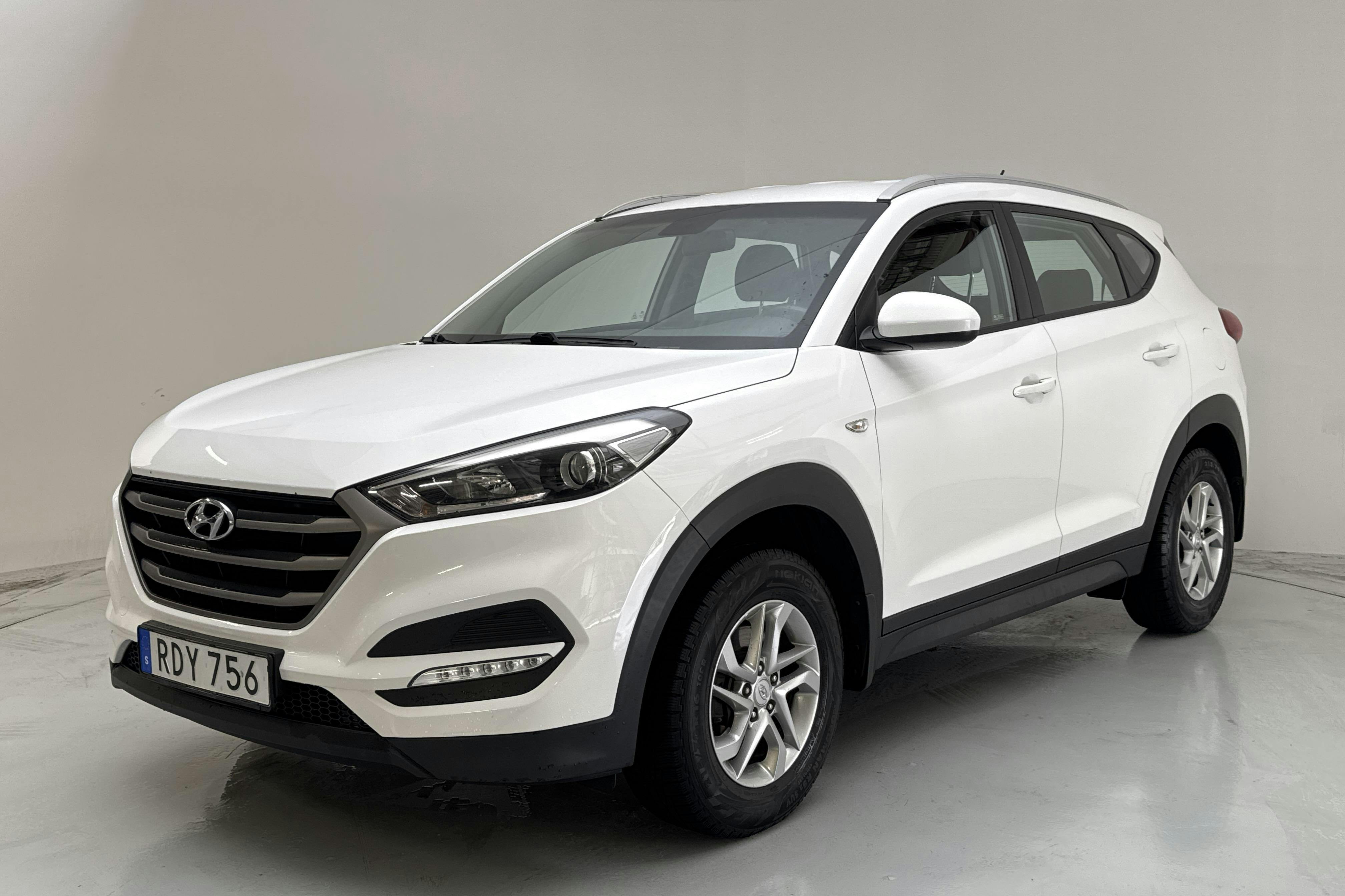 Hyundai Tucson 1.6 GDI 2WD (132hk) - 127 400 km - Manualna - biały - 2017