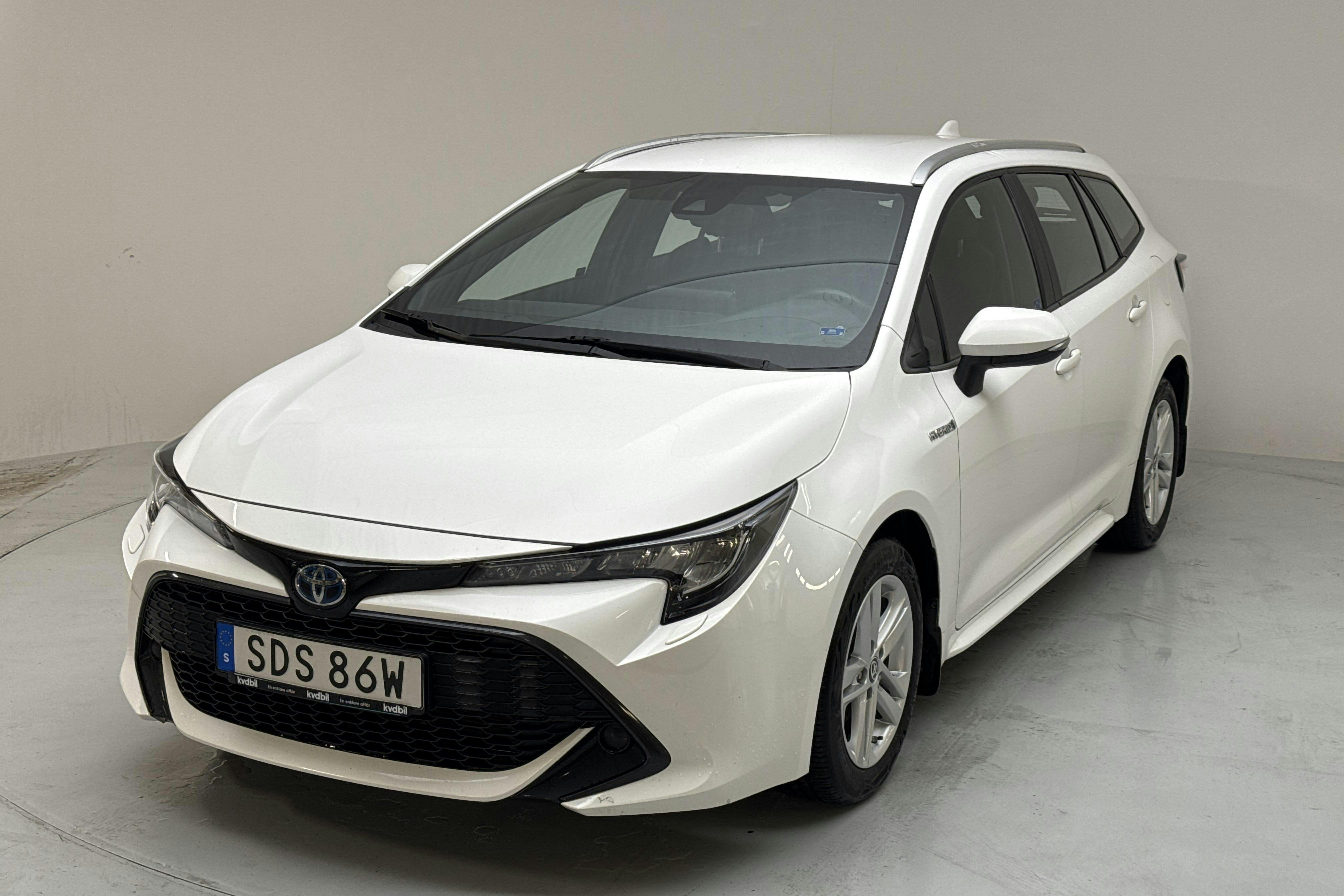 Toyota Corolla 1.8 Hybrid Touring Sports (122hk) - 6 178 mil - Automat - vit - 2021